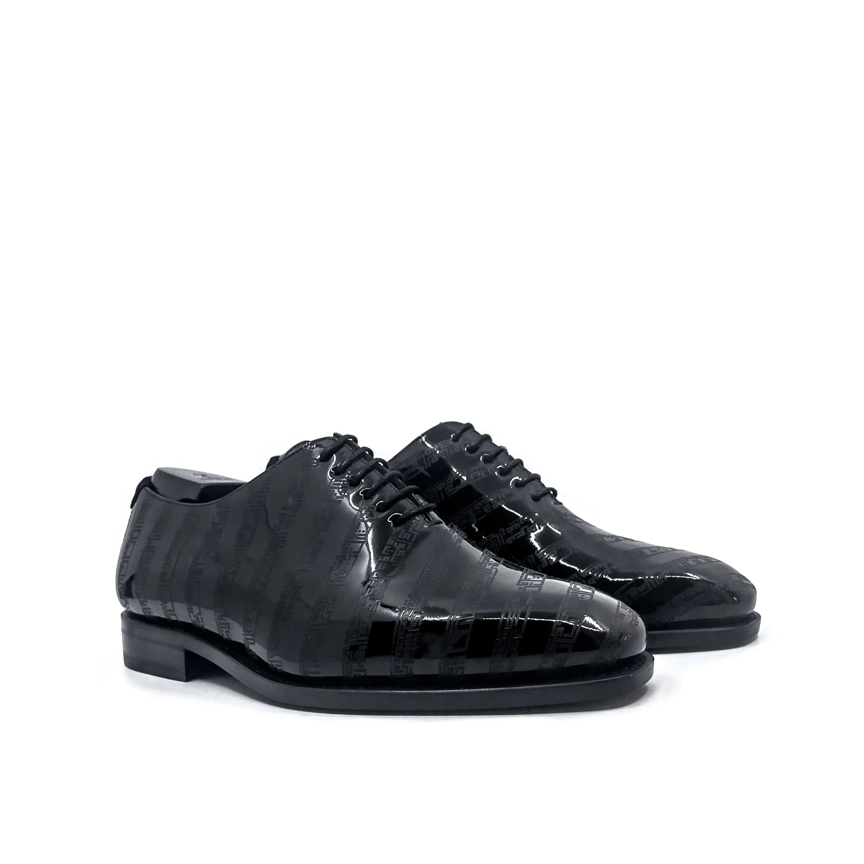 Elegant pair of black patent leather Before The Throne Wholecut Shoes for formal occasions