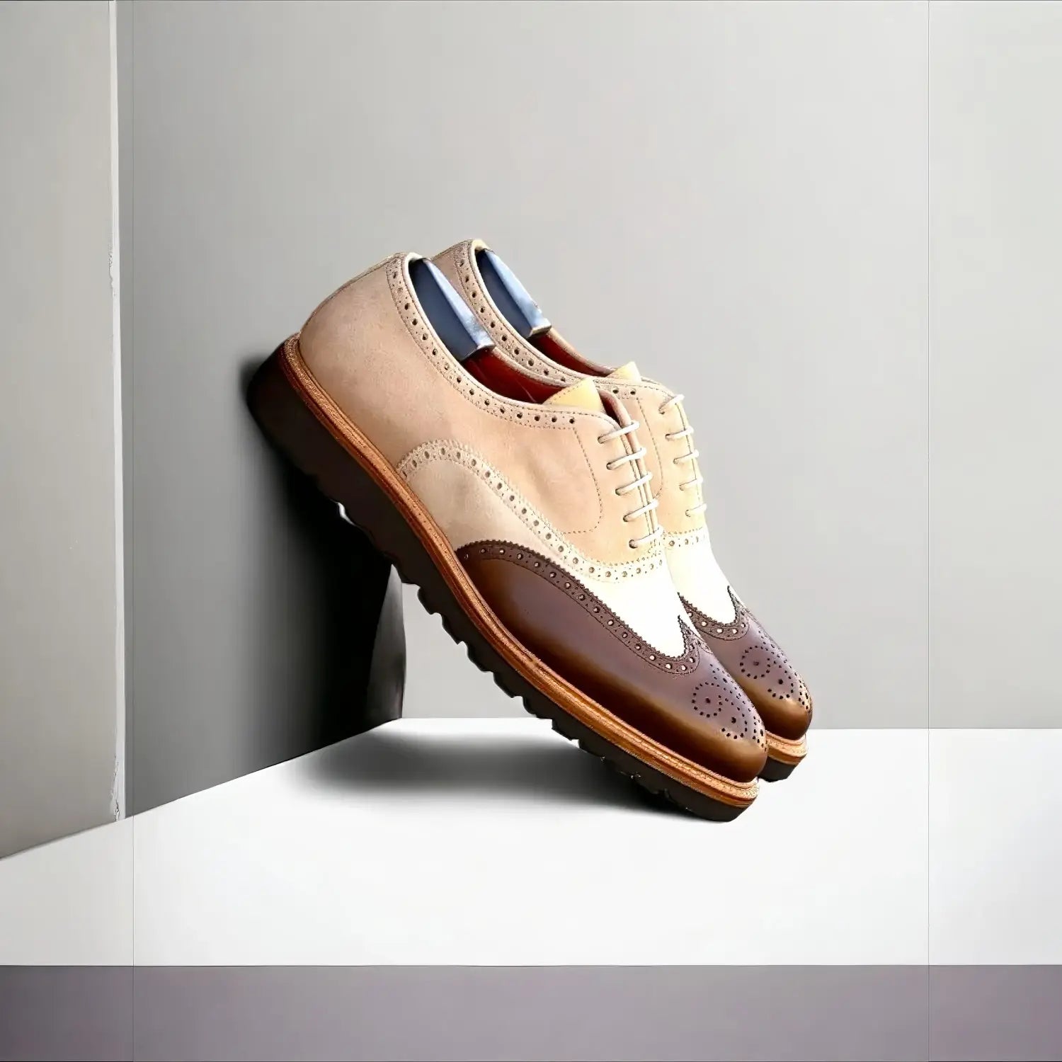 Beige and brown two-tone brogue oxfords with patina shoes detailing