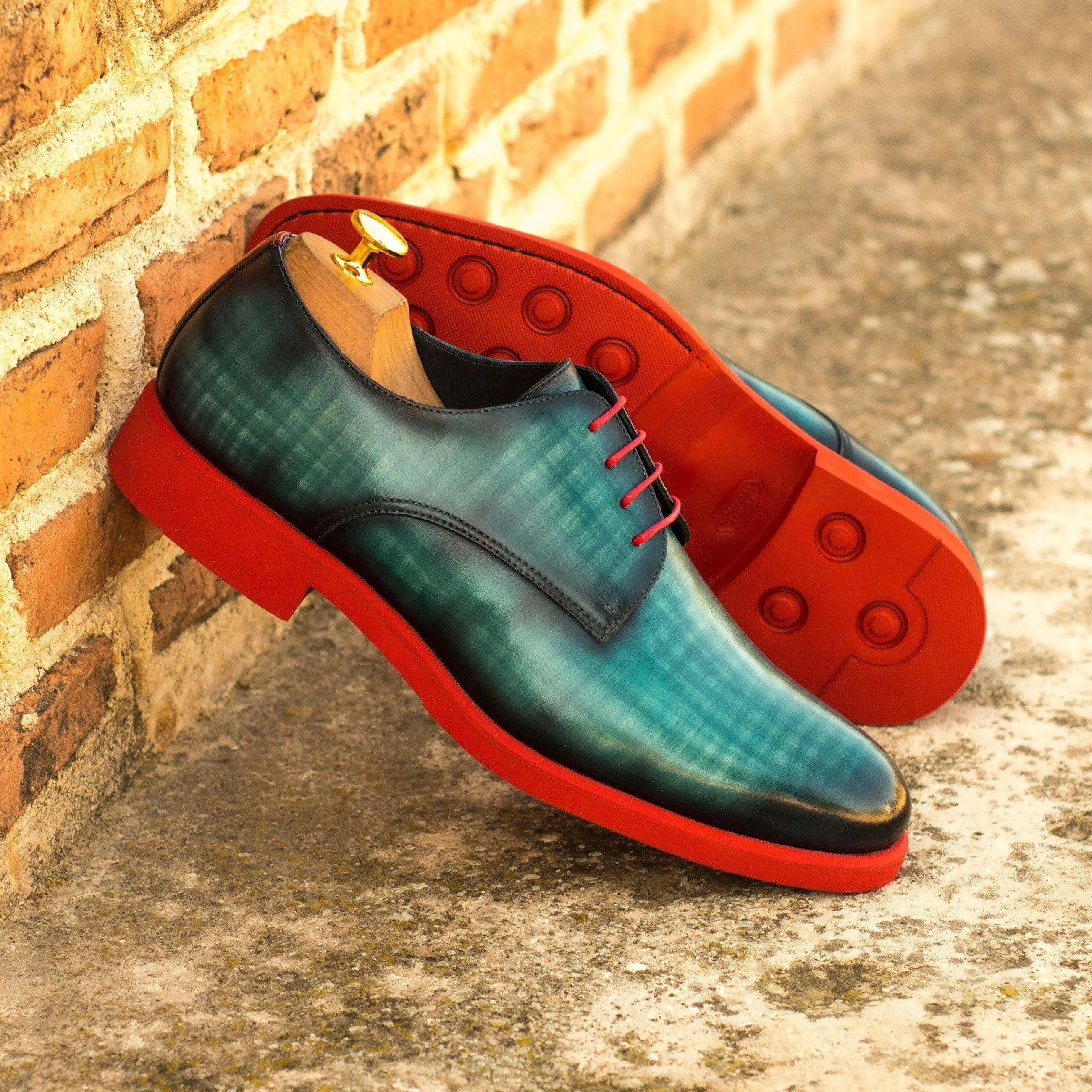 Stylish Birmingham Patina Derby shoes featuring blue and green leather with red soles