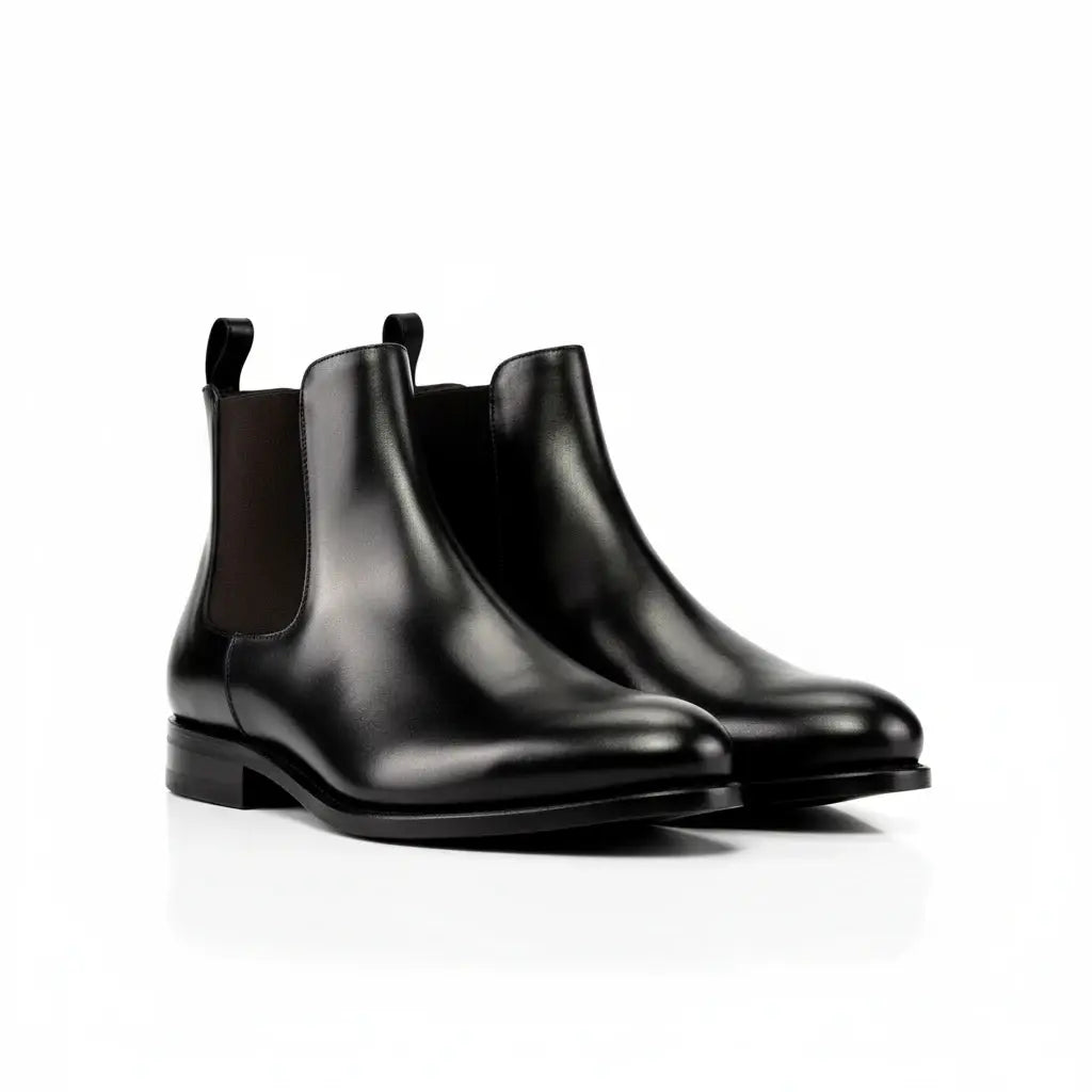 Elegant black leather Chelsea boots in curating luxury footwear collections