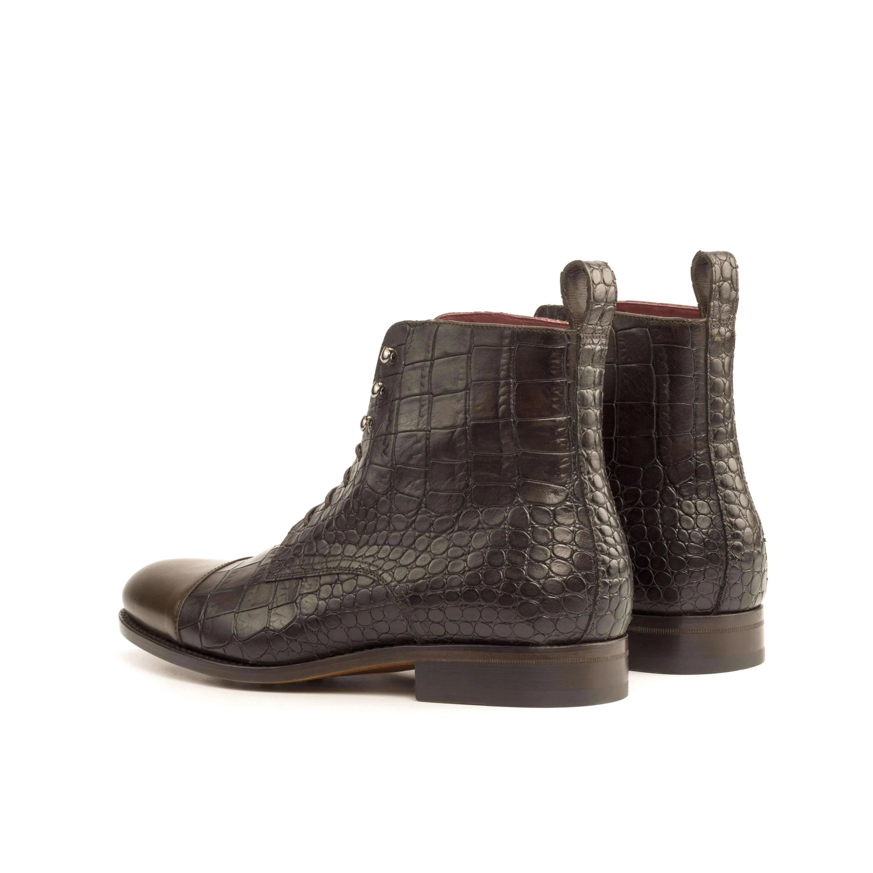 Dark brown painted Bobies Jumper Boots featuring a stylish crocodile-patterned leather design