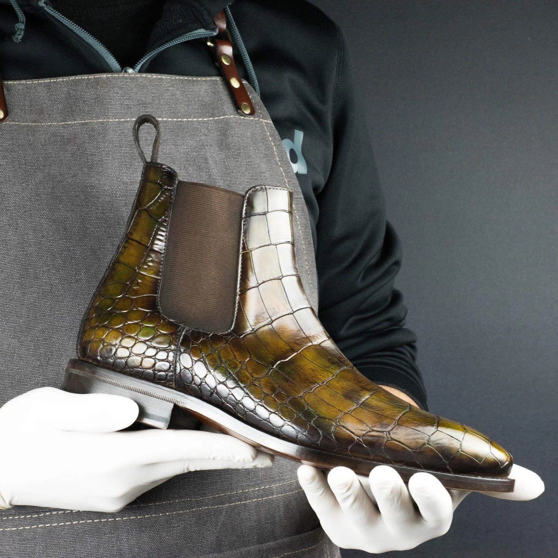 Olive green crocodile-patterned Cairo Patina Chelsea Boots with chisel toe design