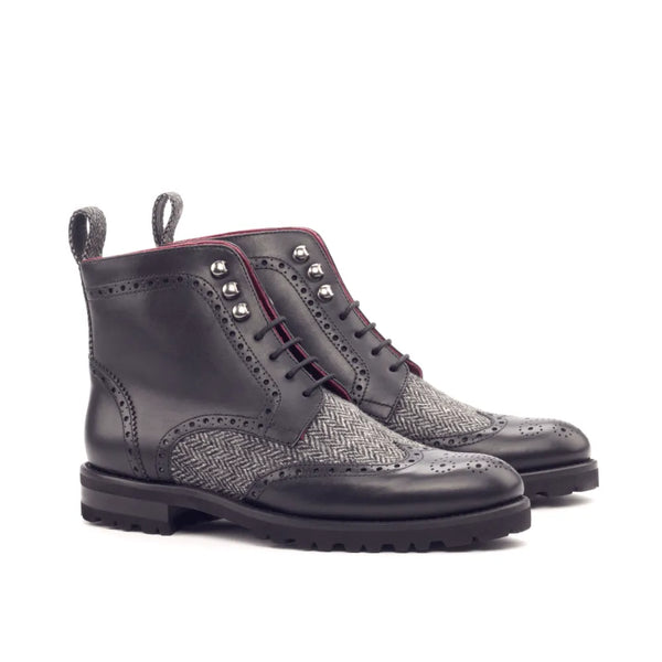 Pair of gray and black leather Camilla Ladies Military Brogue Boots displayed elegantly