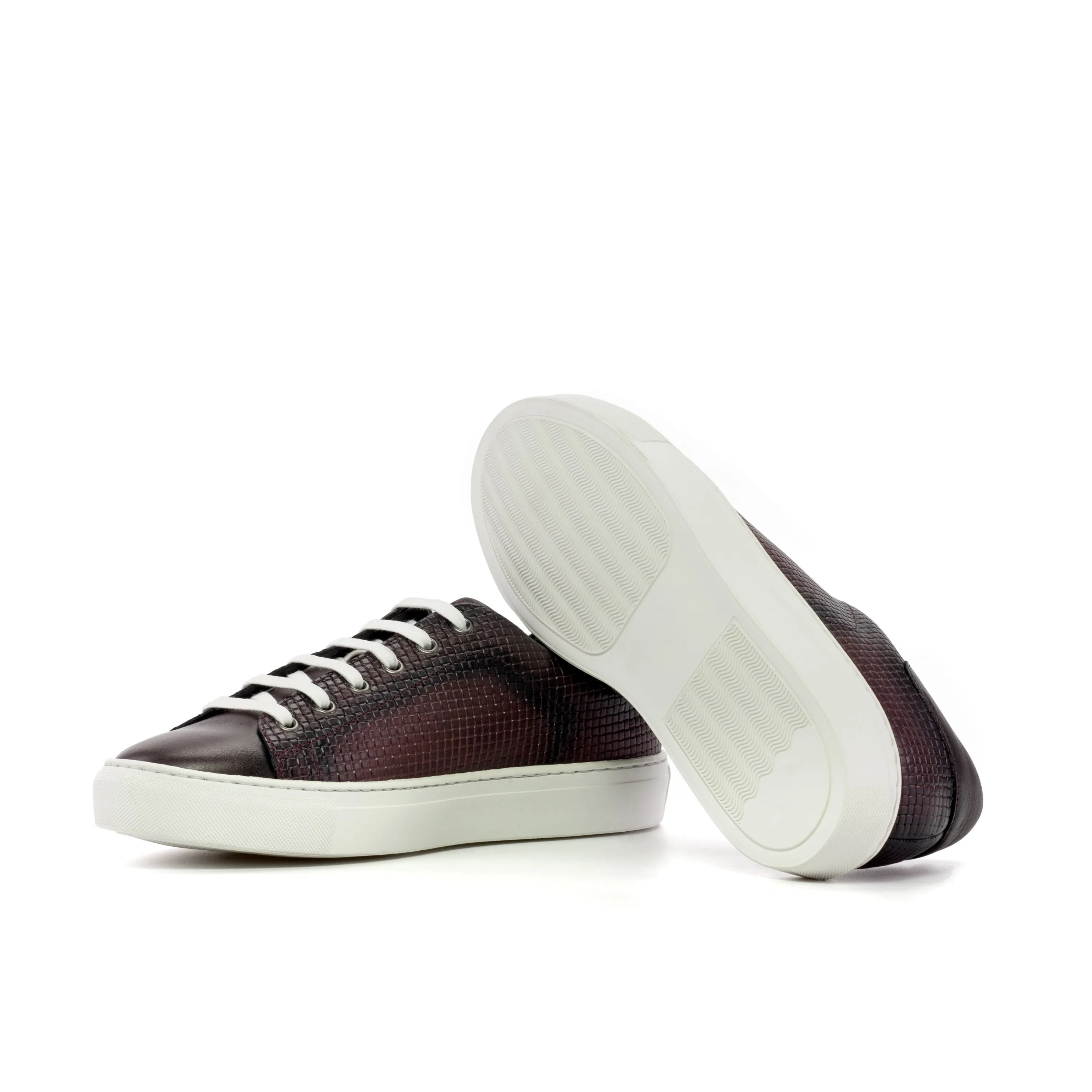 Pair of brown leather sneakers, the stylish CapaOne Trainer Sneaker for everyday wear