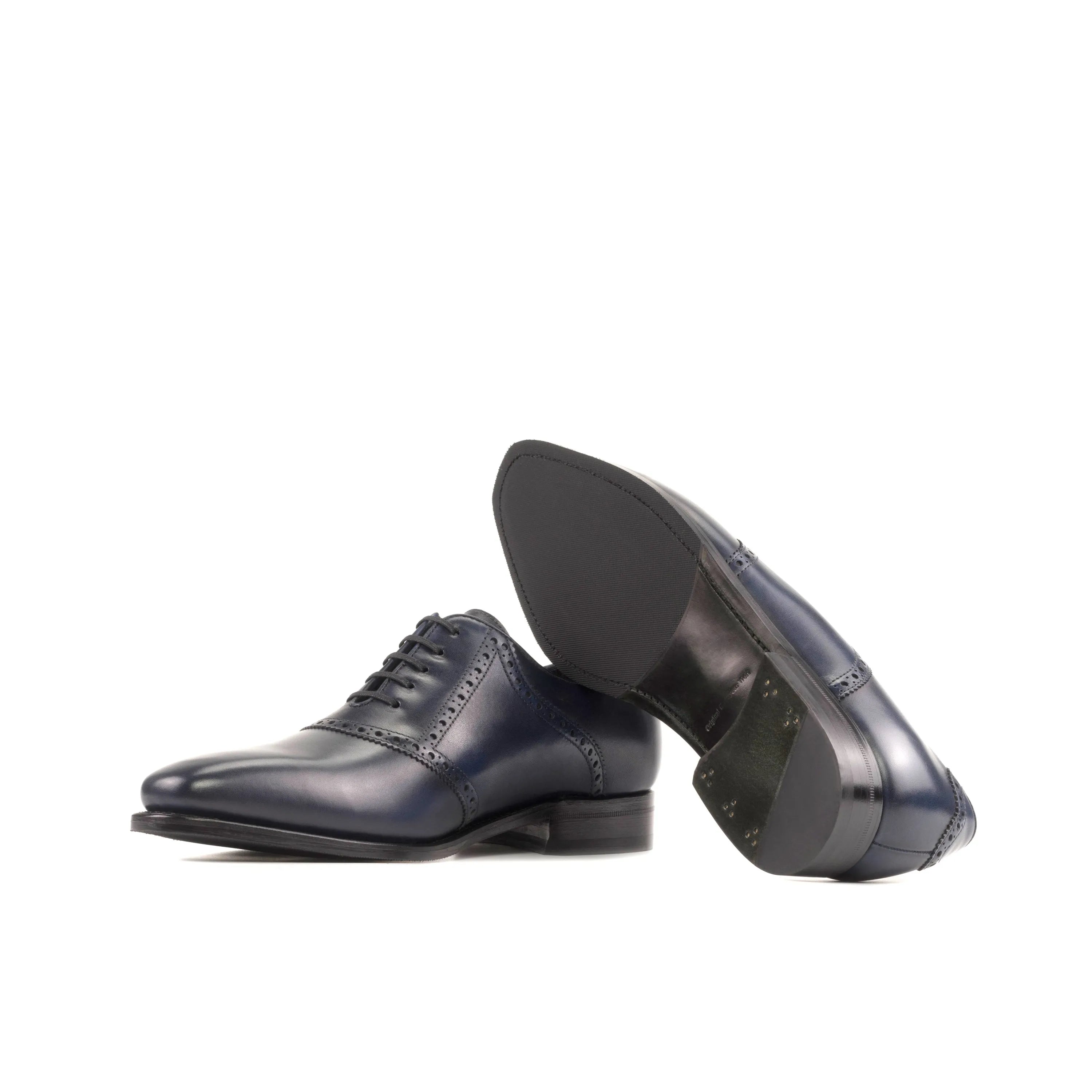 Pair of blue leather dress shoes from the Carmine Saddle Shoes collection