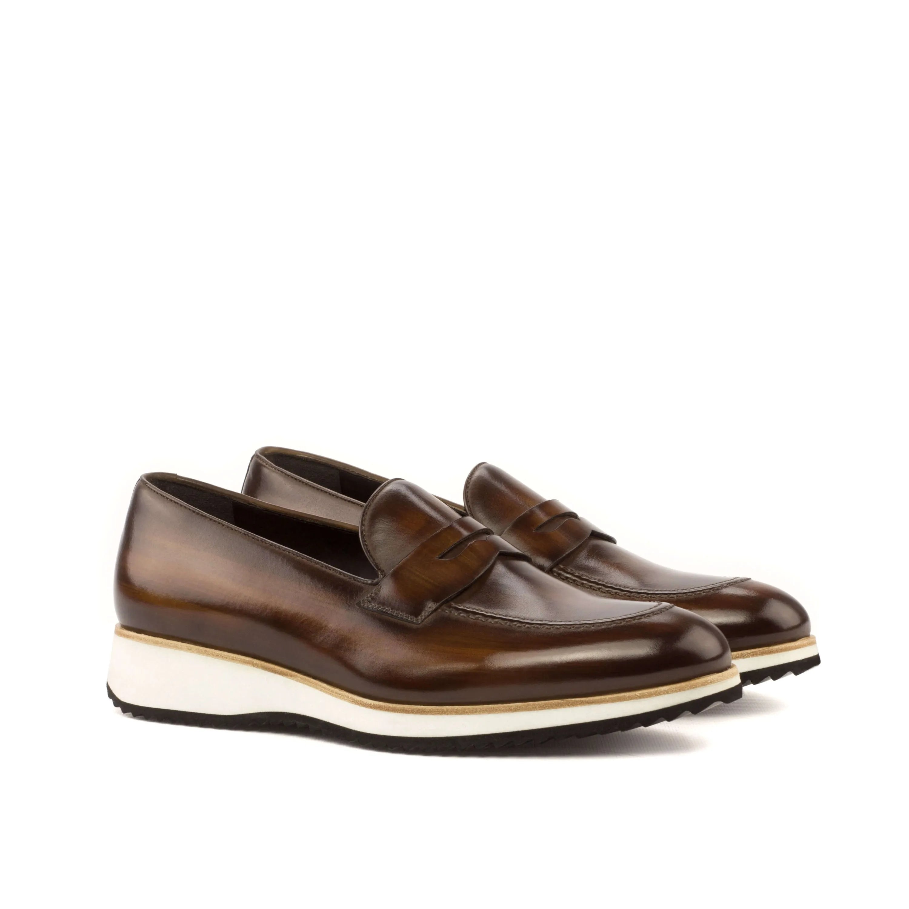 Brown leather Cato Patina Loafers showcasing sleek design and premium craftsmanship