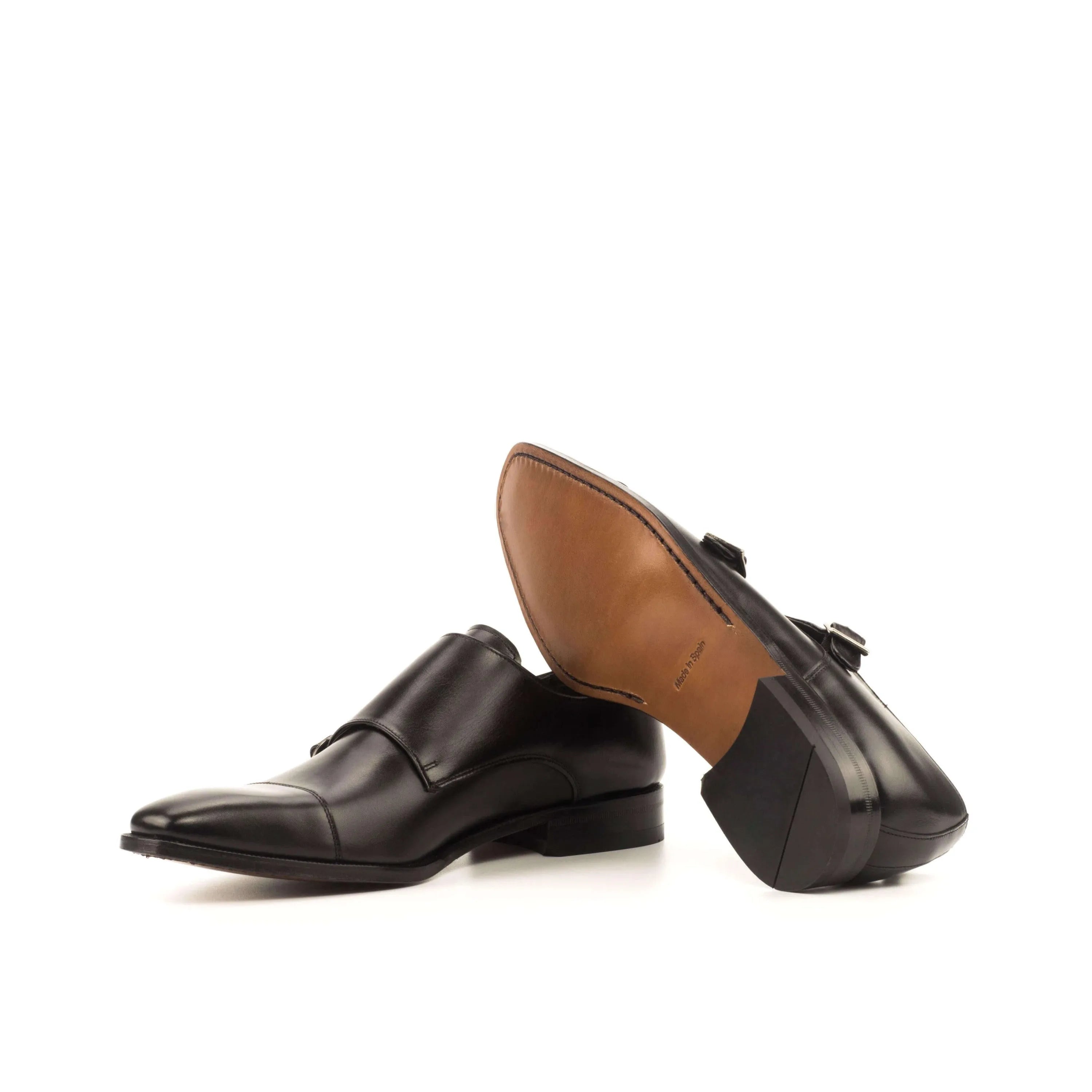 Pair of black leather Cayton Double Monk II shoes featuring a stylish double monk strap design