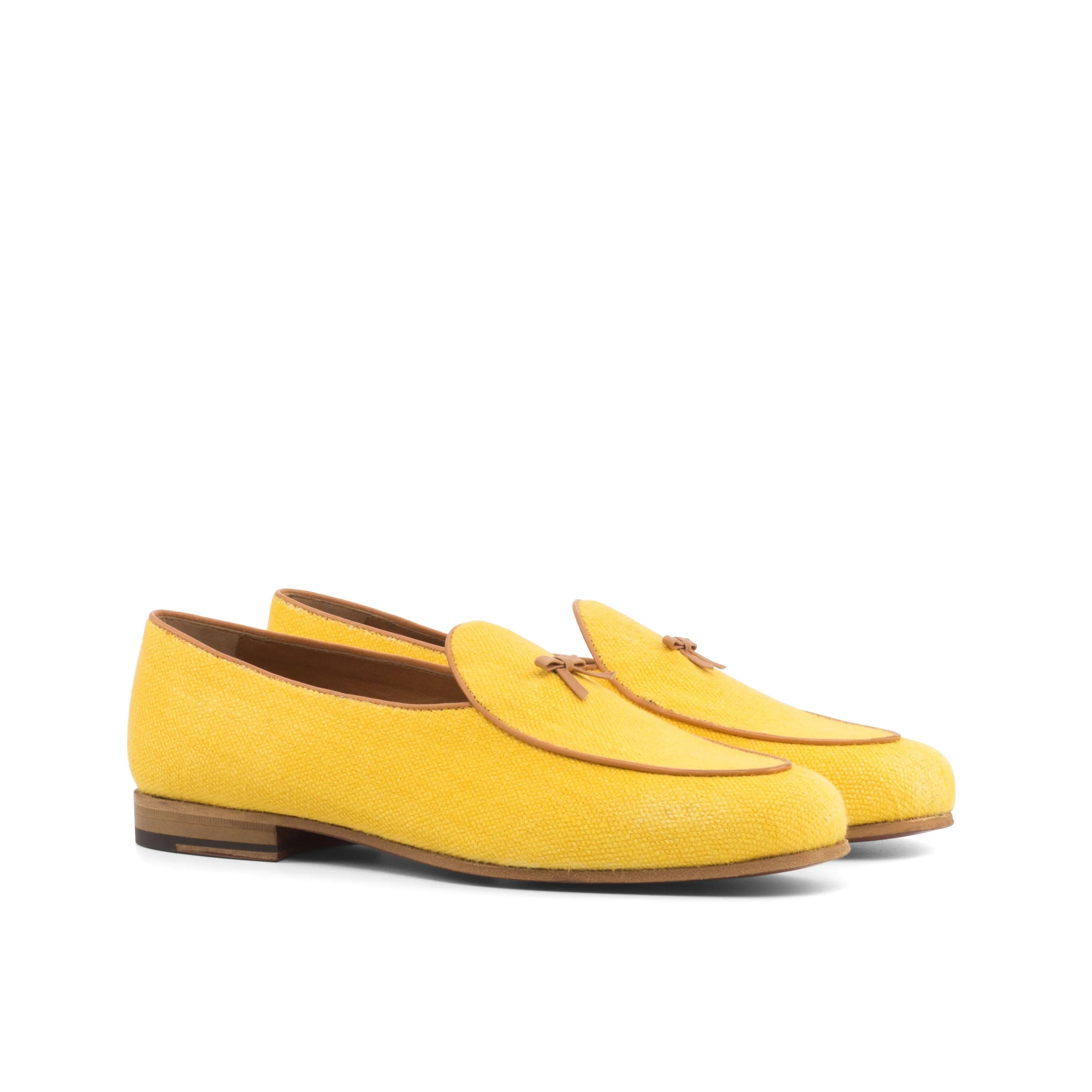 Yellow leather loafers of the Chami Belgian Slipper II displayed elegantly