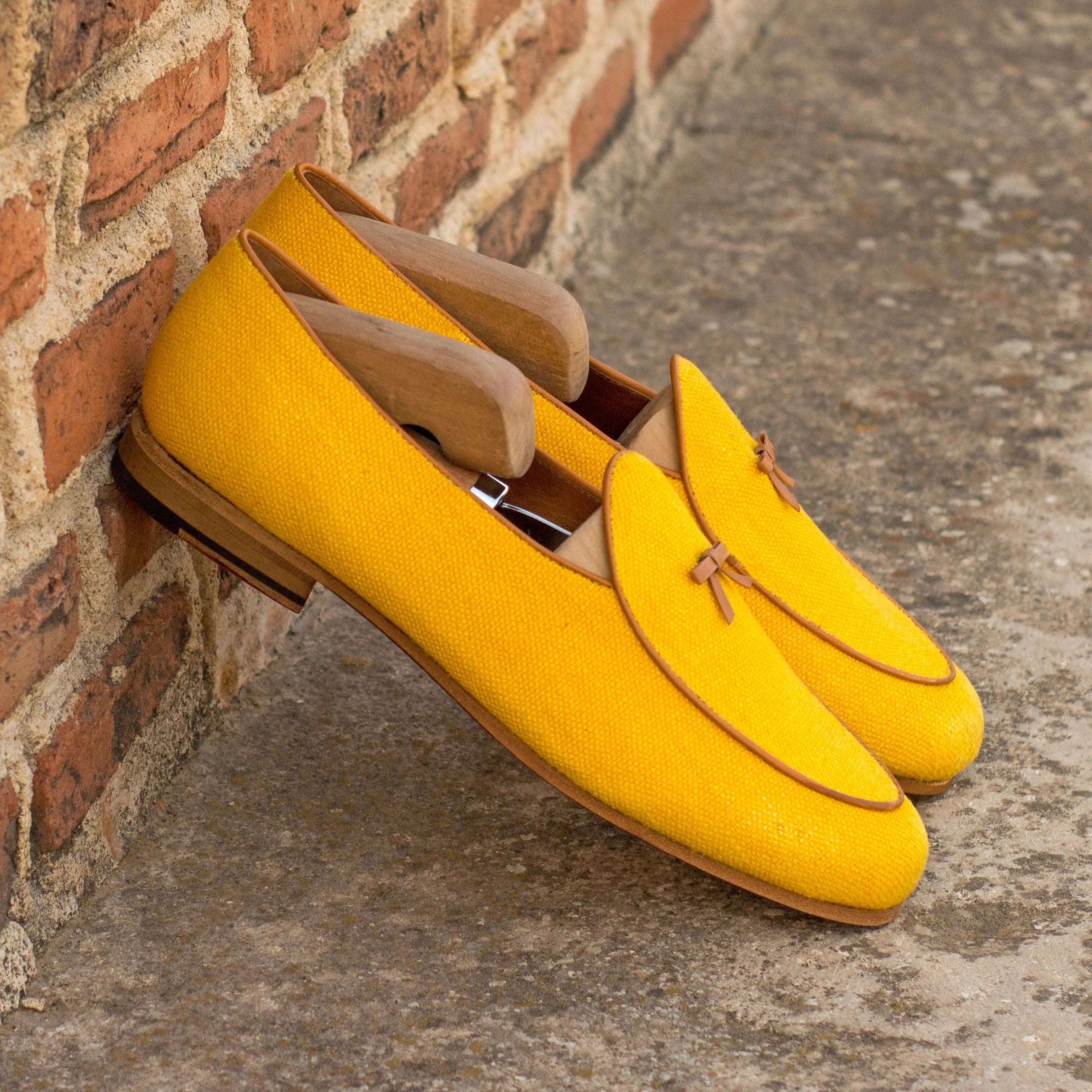 Yellow canvas loafers showcasing the Chami Belgian Slipper for stylish comfort
