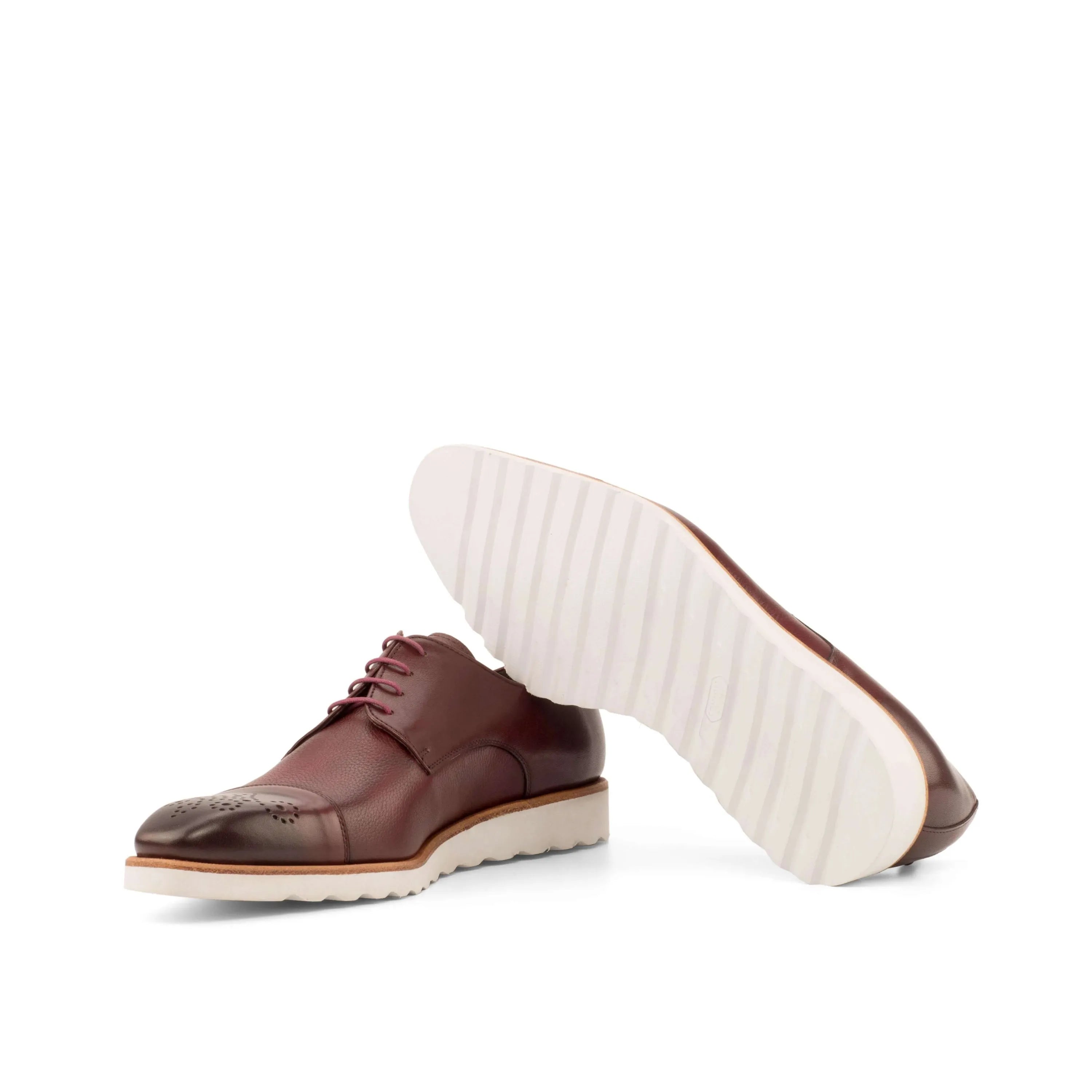 Burgundy leather Chaska Derby Shoes showcased for stylish formal wear