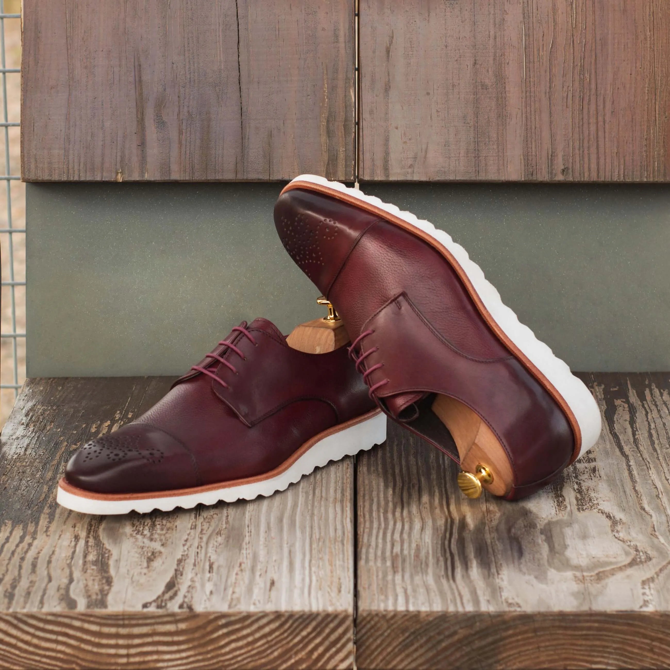 Burgundy leather Chaska Derby Shoes showcasing elegant style and craftsmanship