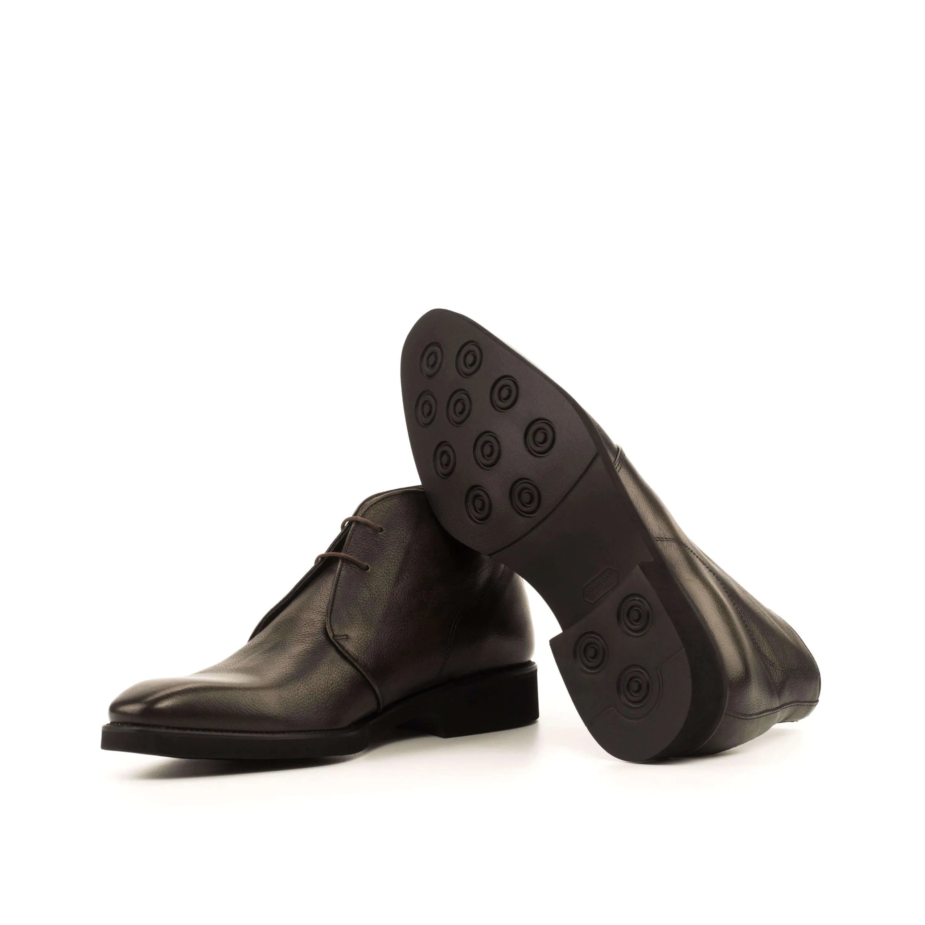 Pair of dark leather Chesmu Chukka Boots II showcasing stylish chukka boots design