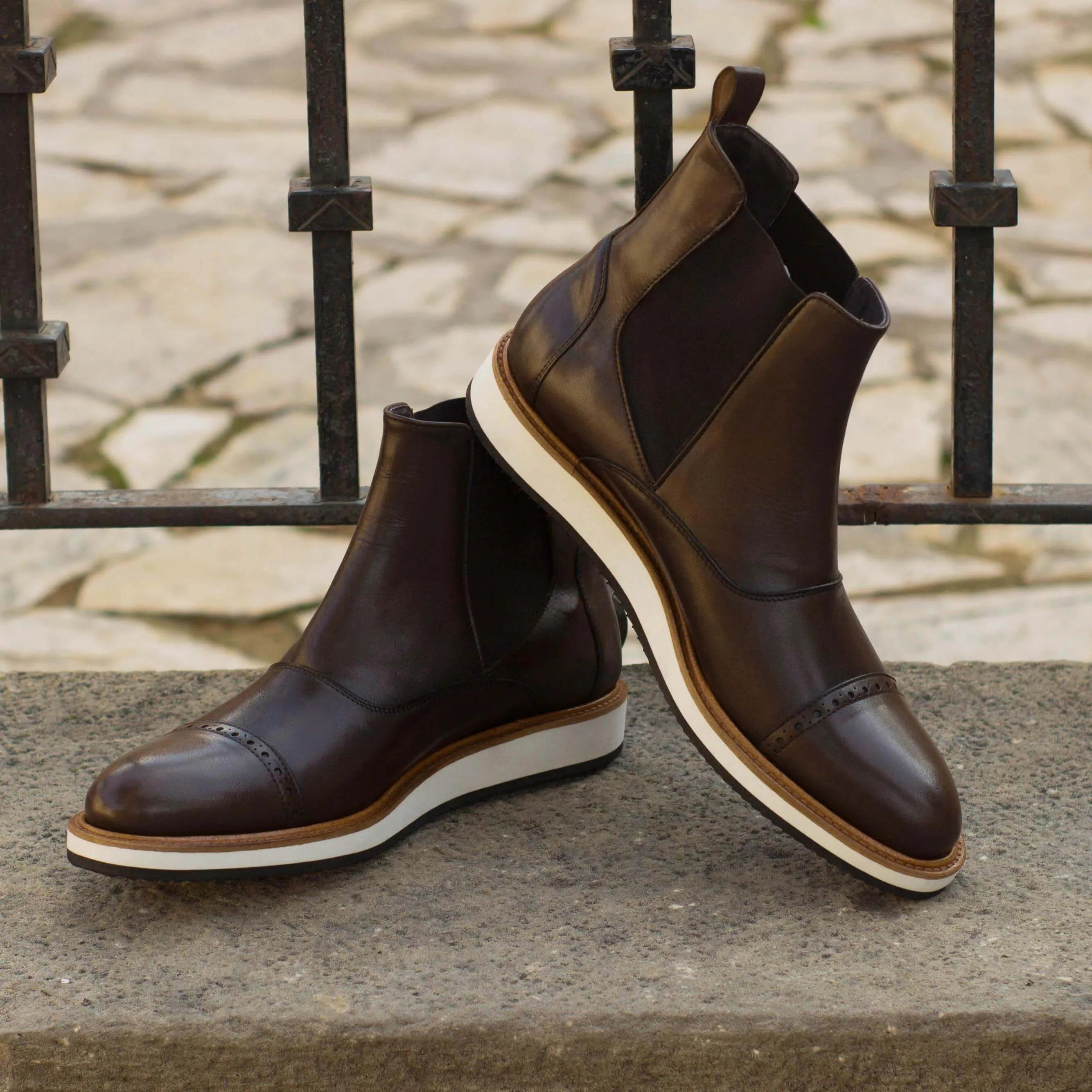 Brown leather Choovio Chelsea Boots II featuring stylish white soles for a modern look