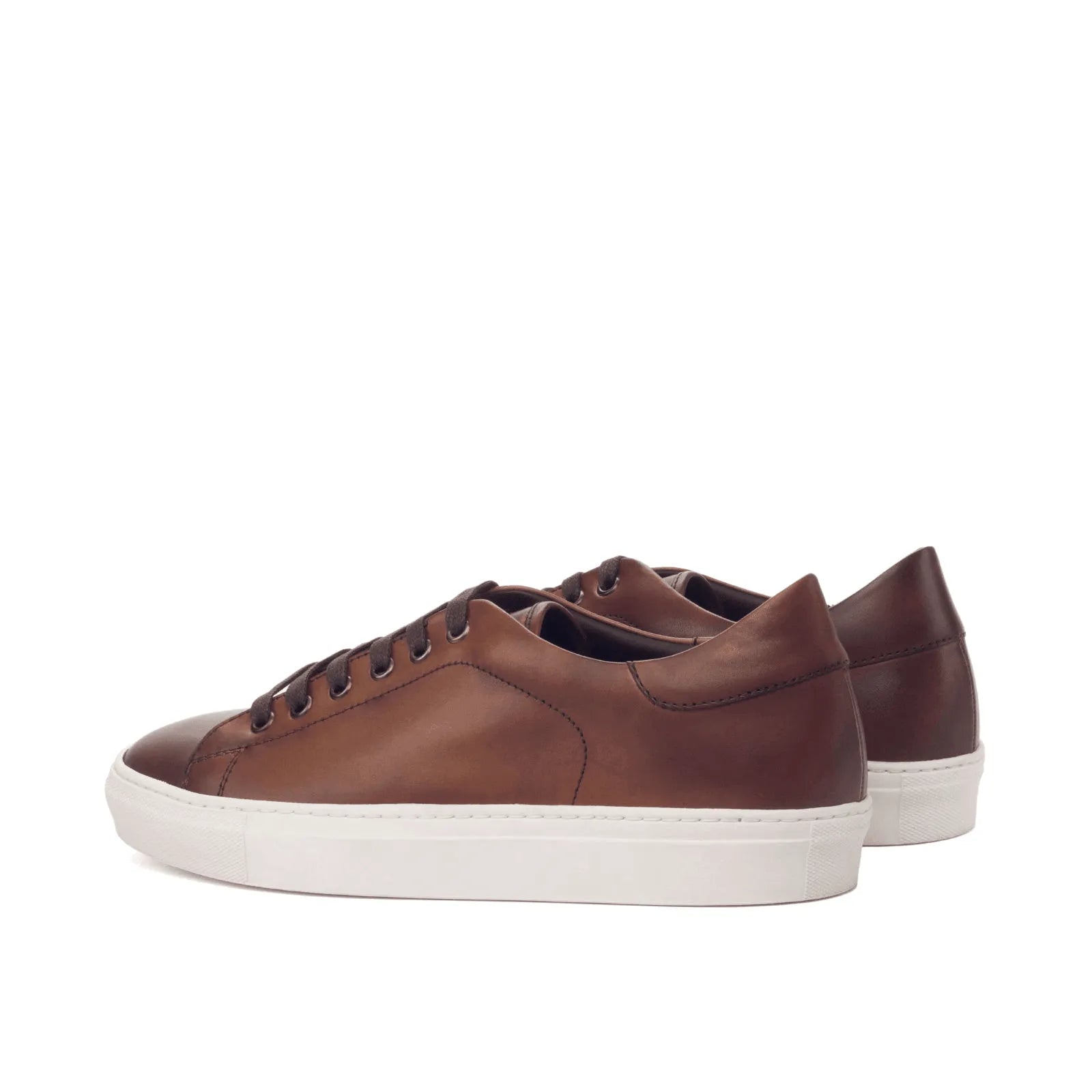 Brown leather Claus Trainer Sneaker II with white soles, perfect for stylish comfort