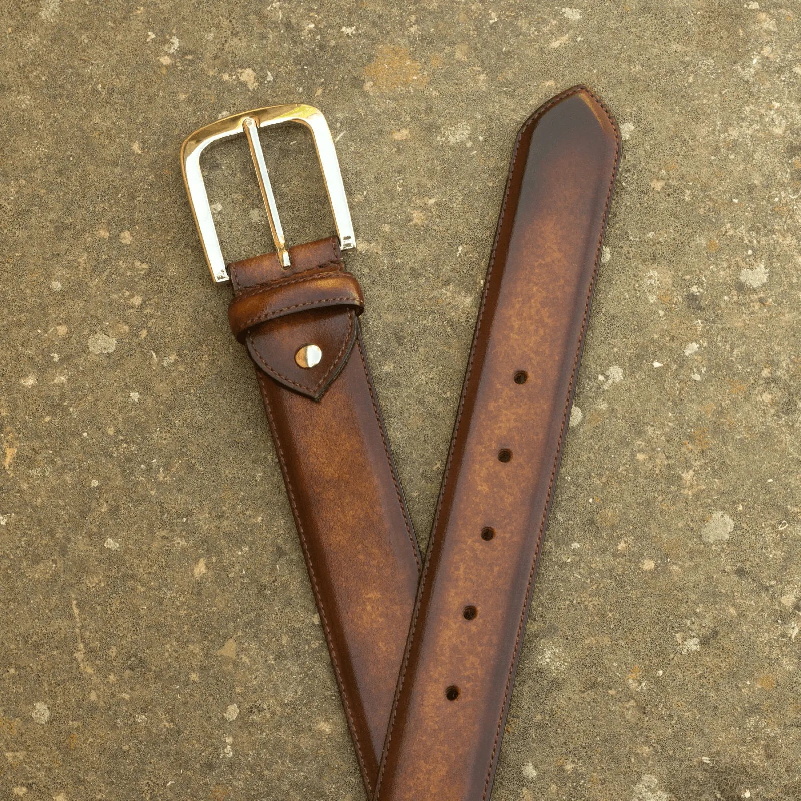 Brown leather Corallo Hampton Patina Belt with a gold buckle for stylish ensembles
