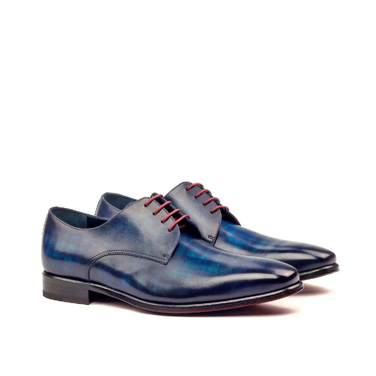 Pair of blue leather Cruz Patina Derby shoes featuring elegant patina finish