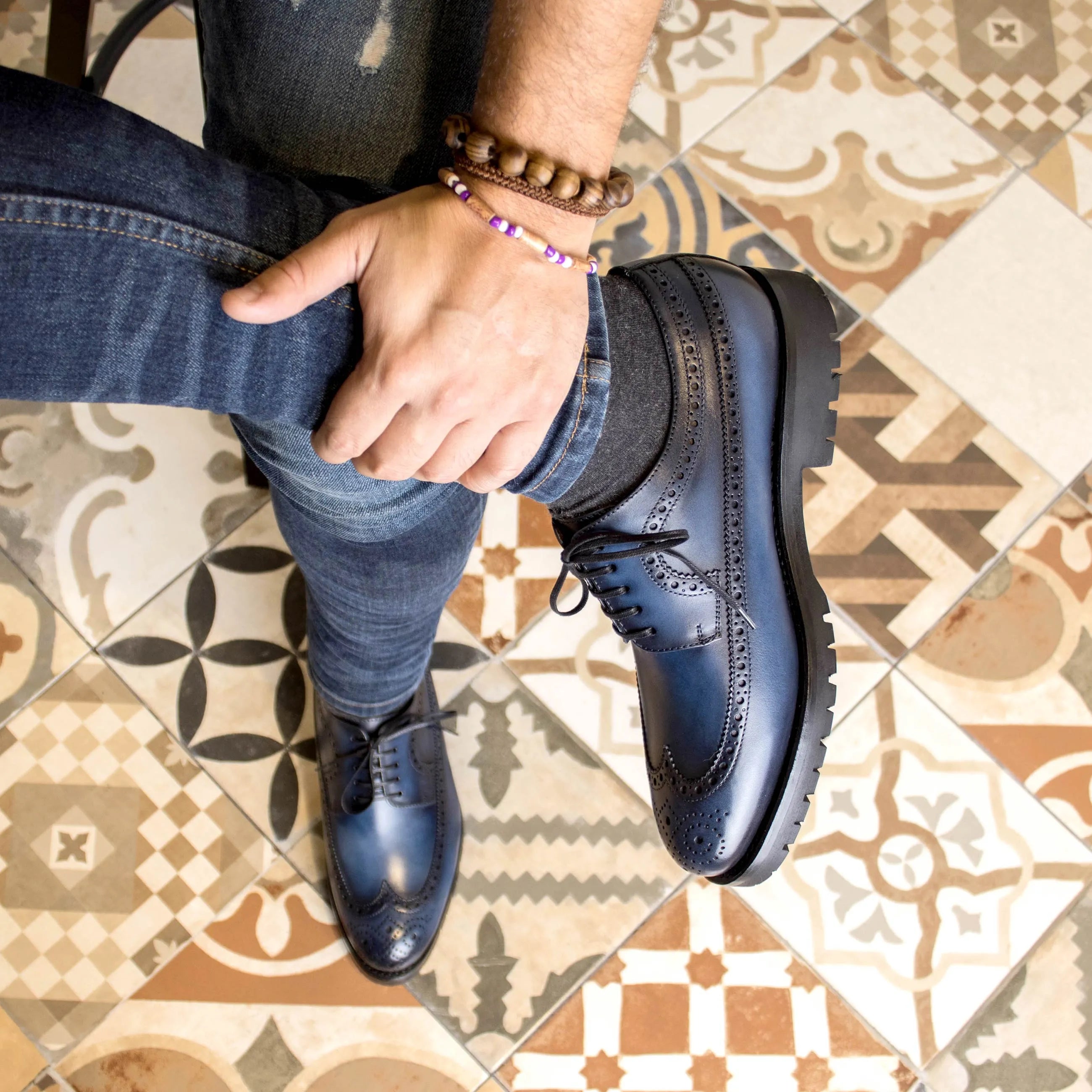 Blue leather Dario Longwing Blucher shoes, featuring classic wingtip design