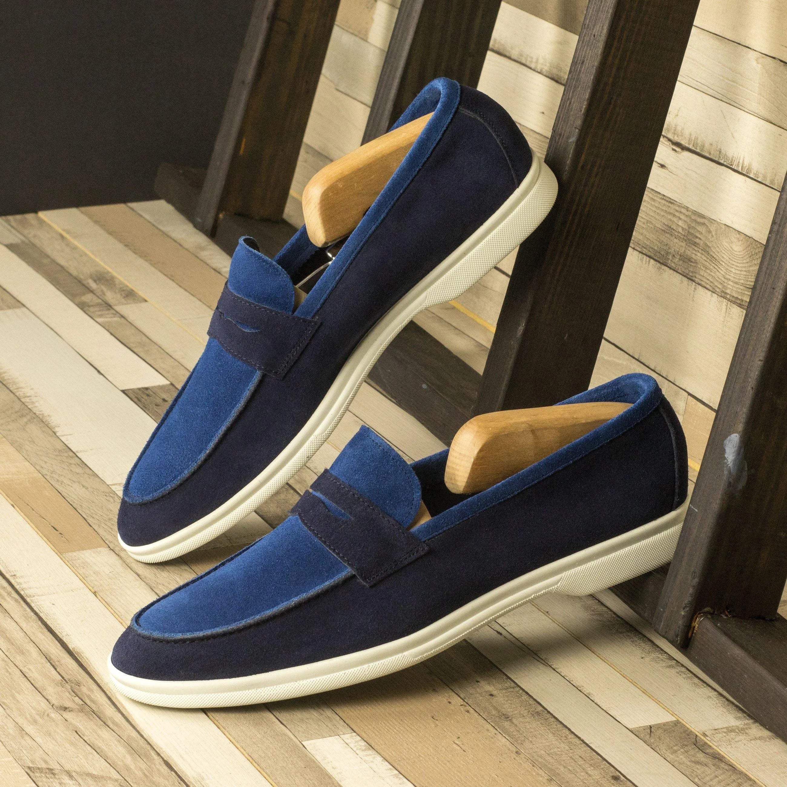 Pair of blue suede calf leather loafers from the Dave Moc Flex Shoes collection