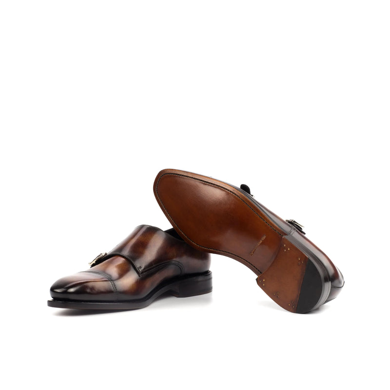 Pair of brown leather Deen Double Monk Patina Shoes II featuring a chisel toe design