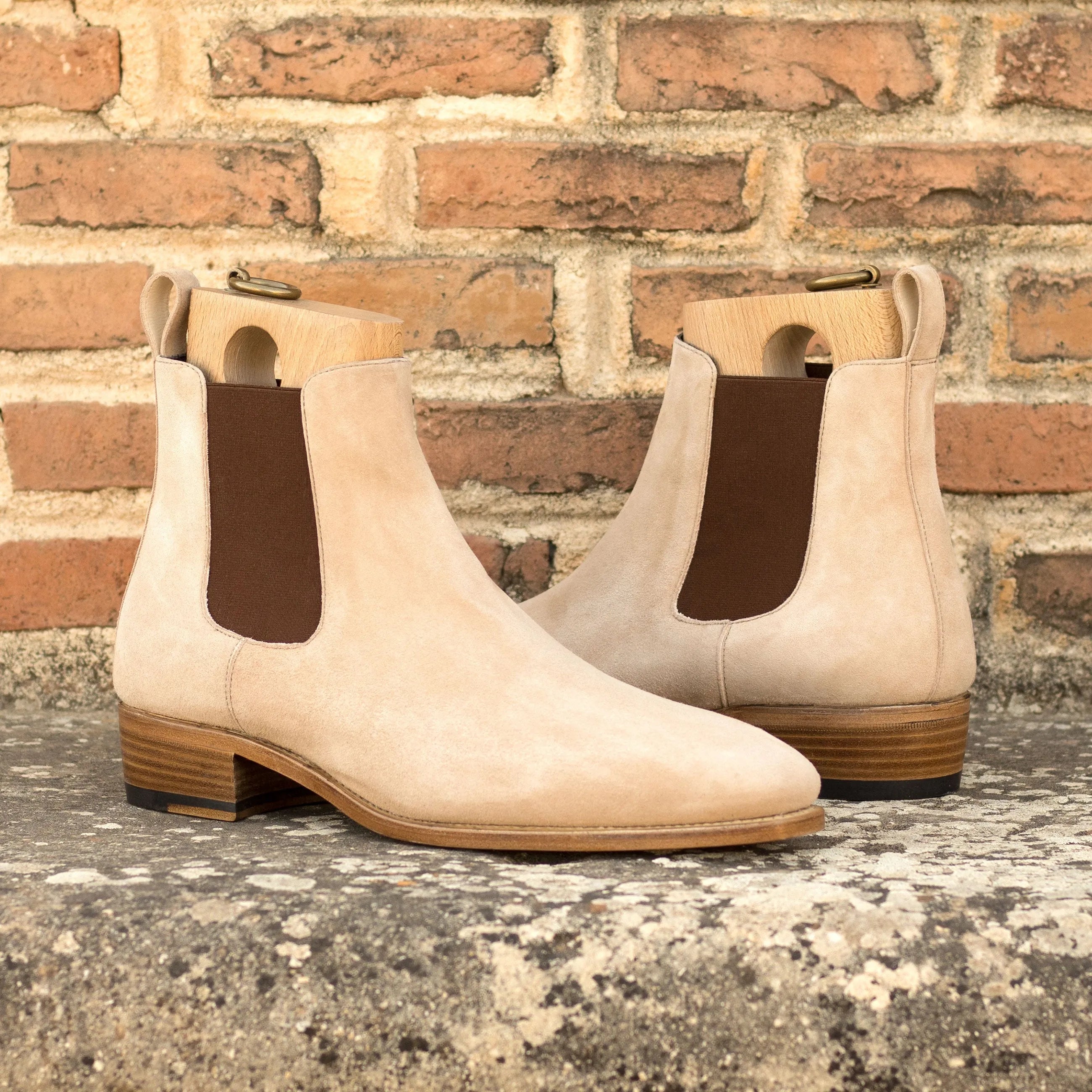Beige suede Deneb Chelsea Boots displayed on a neutral background for stylish footwear