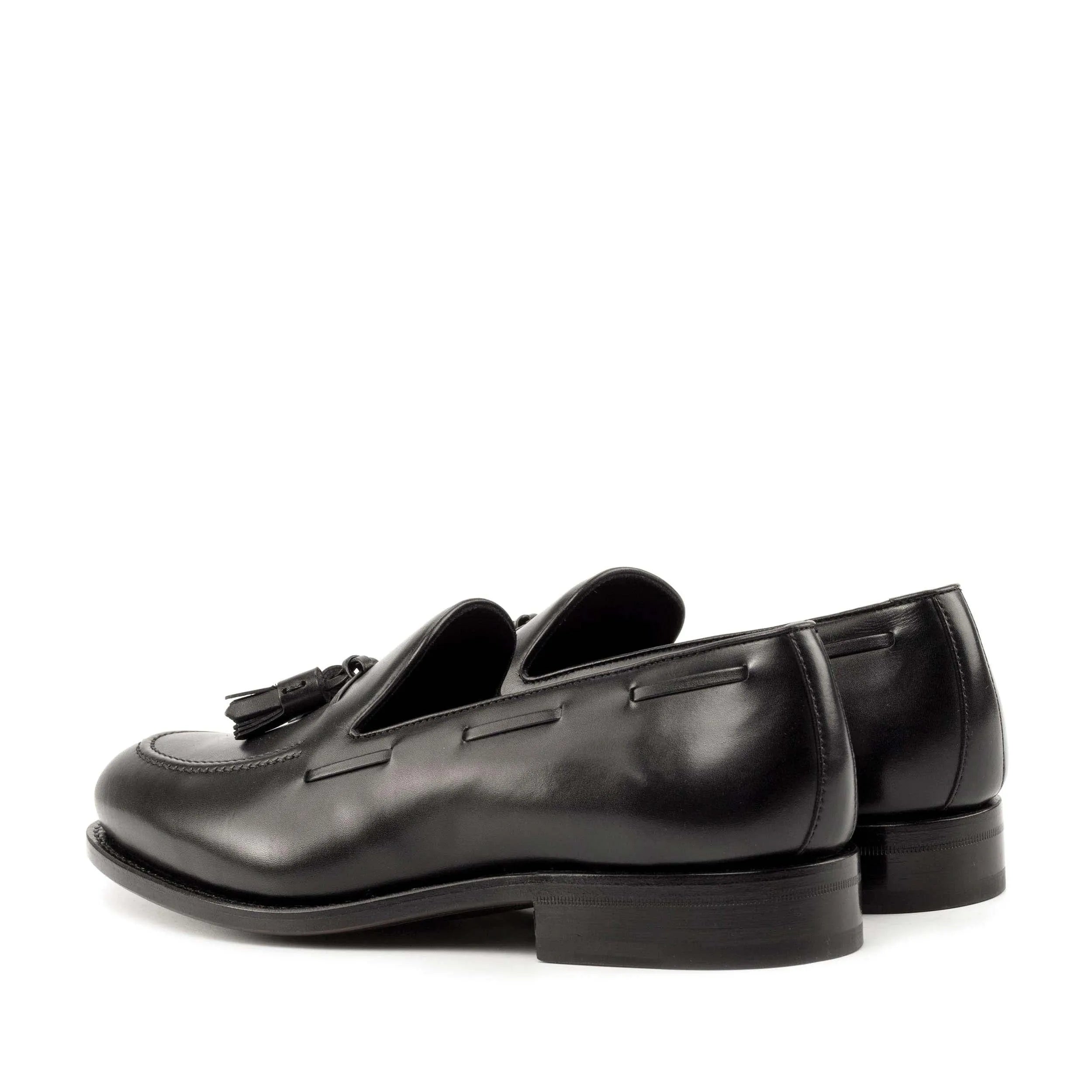 Black leather tassel loafers from the Denver Loafers collection, perfect for business days