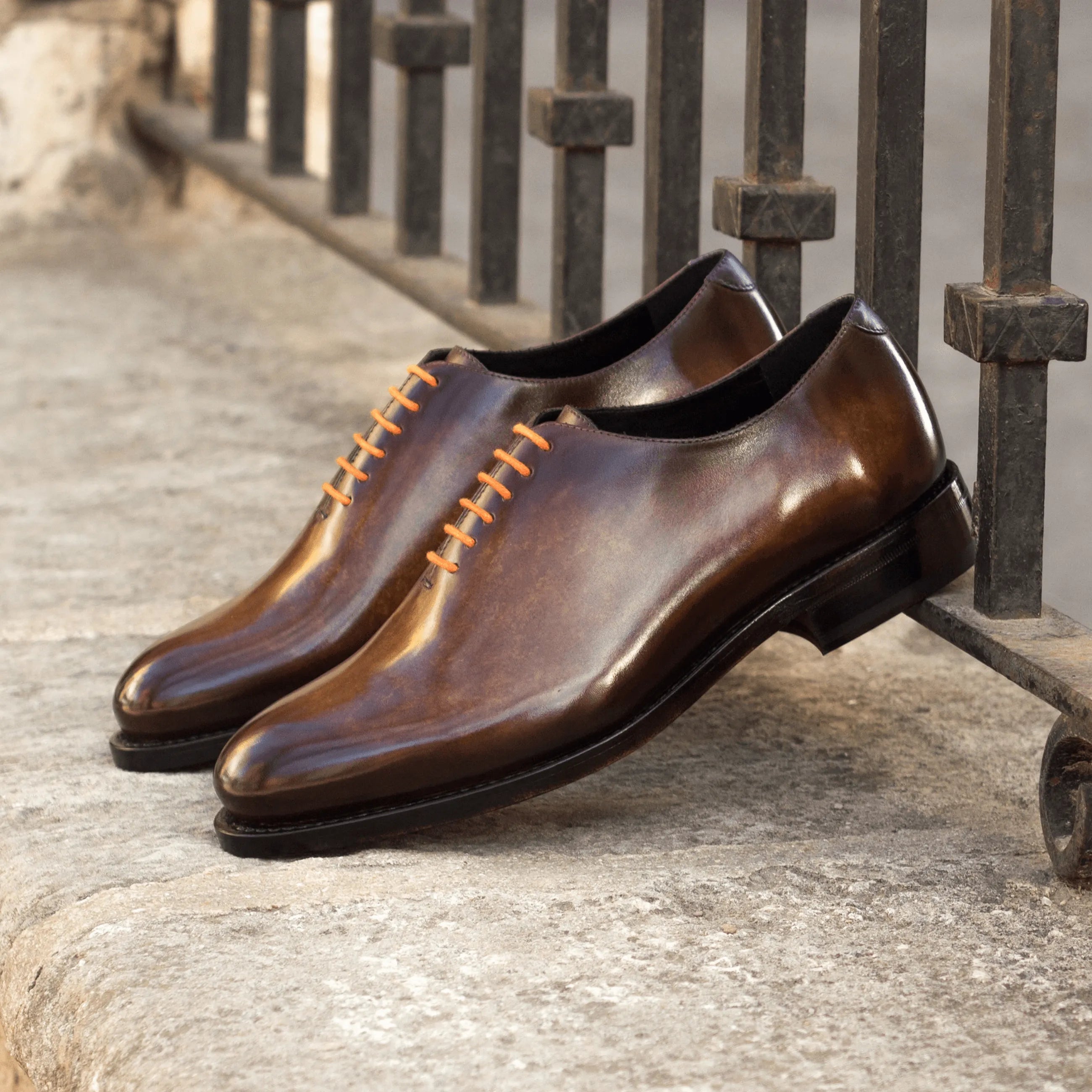 Brown leather Dillinger Whole Cut Patina II shoes featuring orange laces and rounded toe