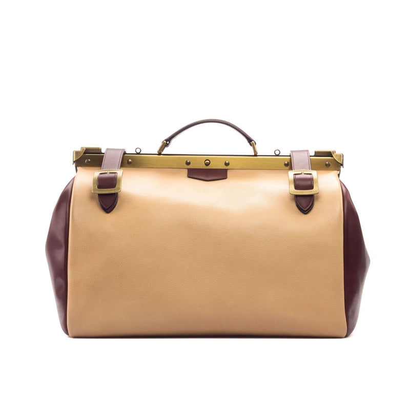 Tan and brown leather doctor’s bag named Doc 2 Bag, showcasing unique savoir-faire