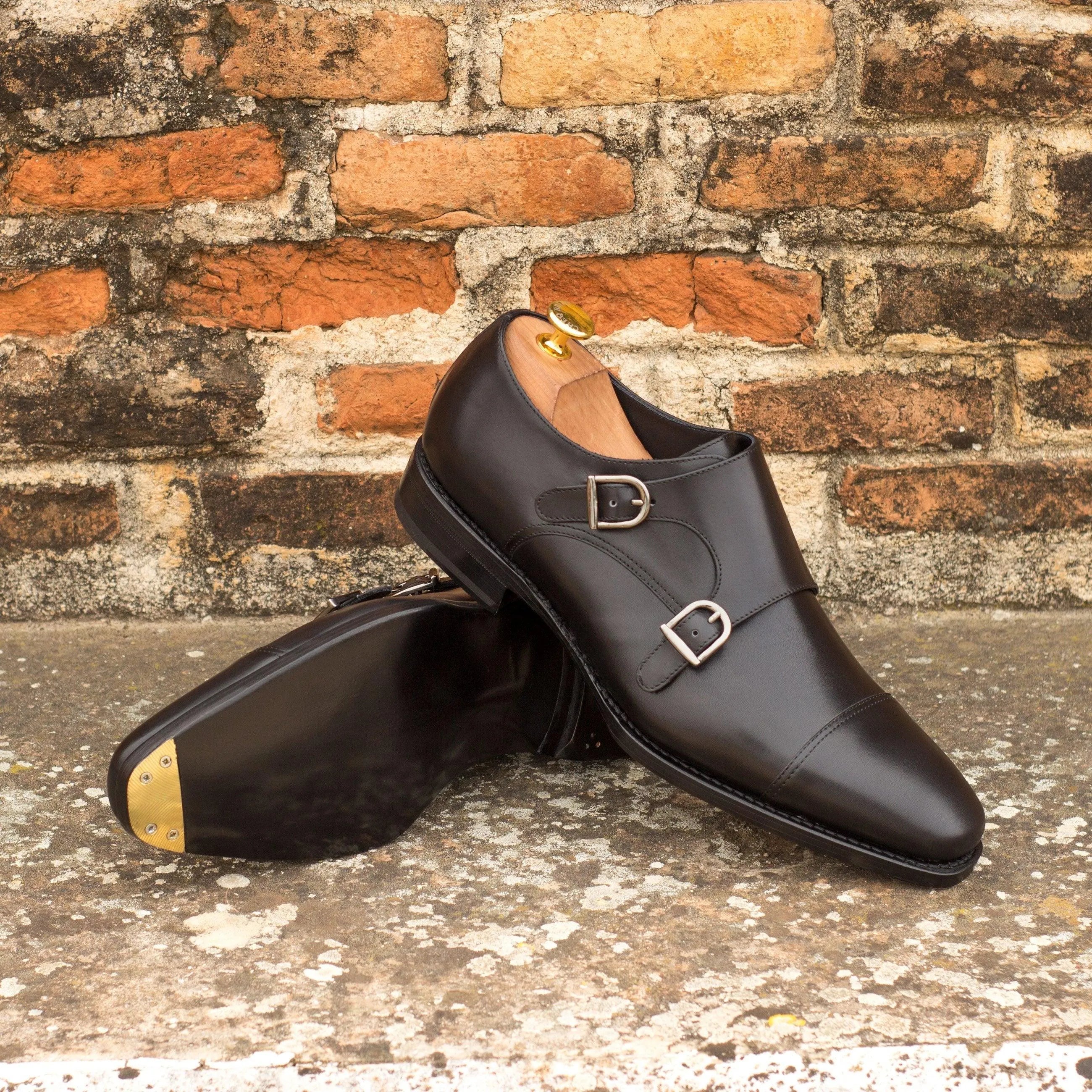 Black leather double monk strap shoes from the Dominto Double Monk II collection