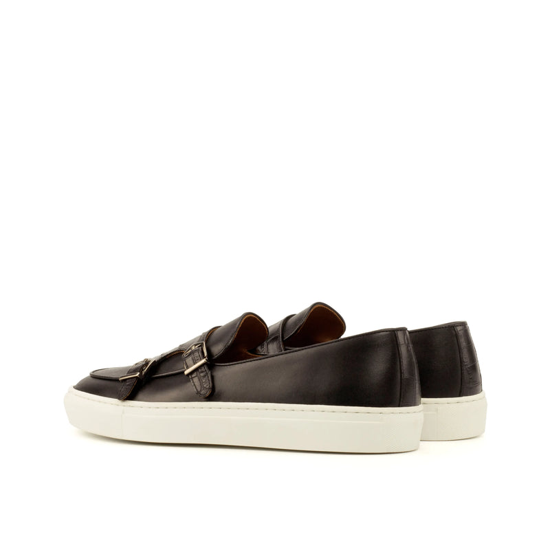 Black leather monk strap sneakers.