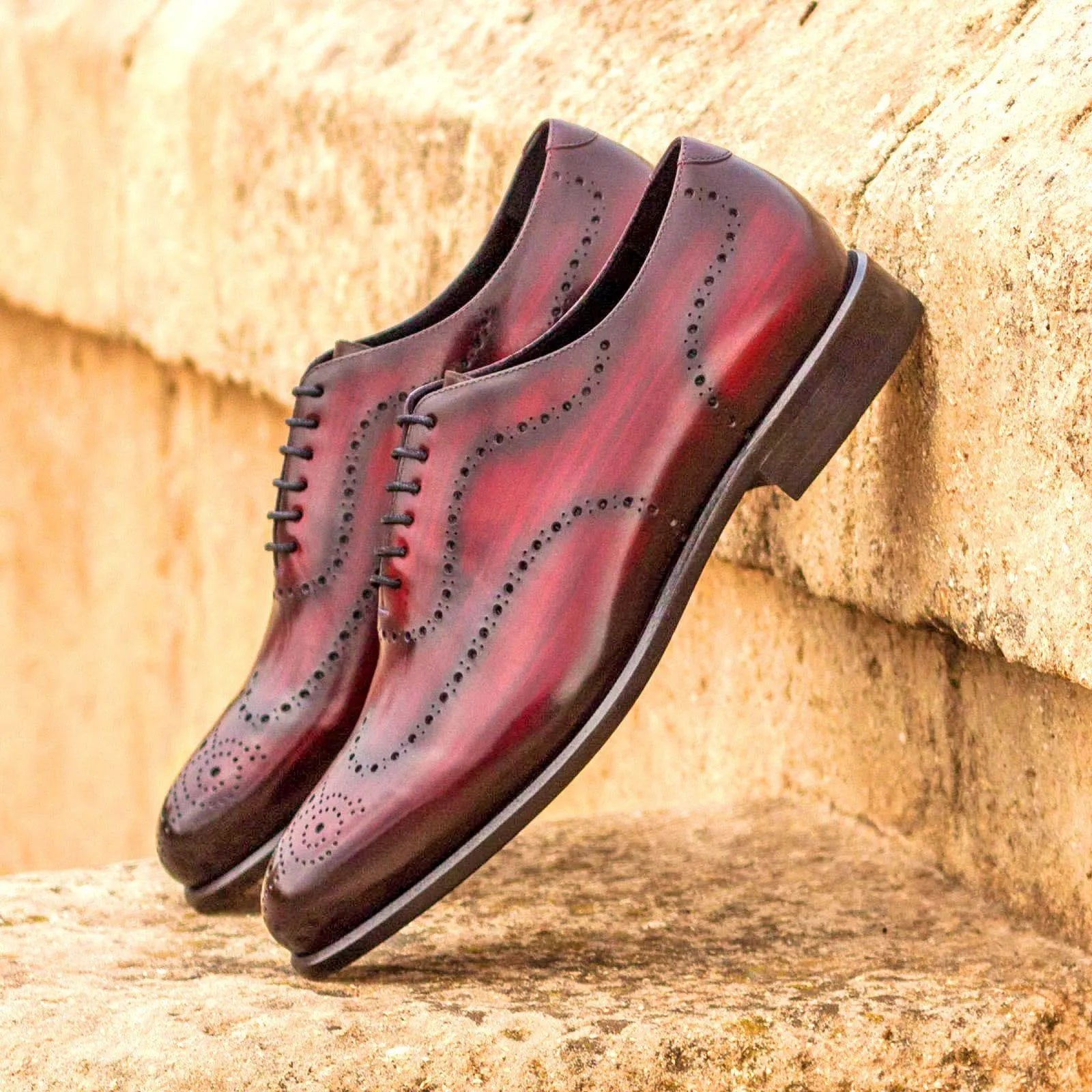 Burgundy leather wingtip dress shoes from the Donny Whole Cut Patina collection