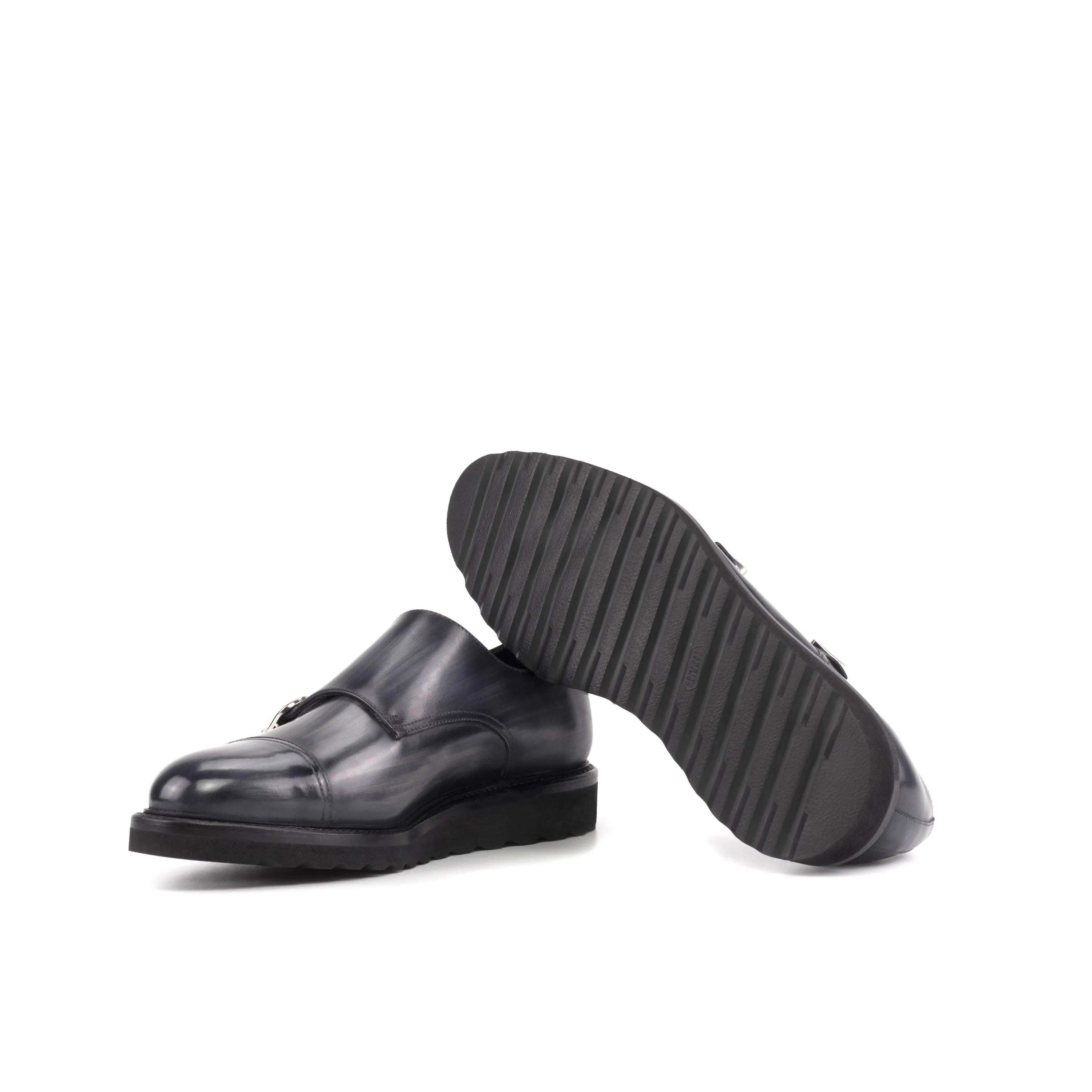 Pair of black leather monk strap shoes from Dukhan Patina Double Monk collection