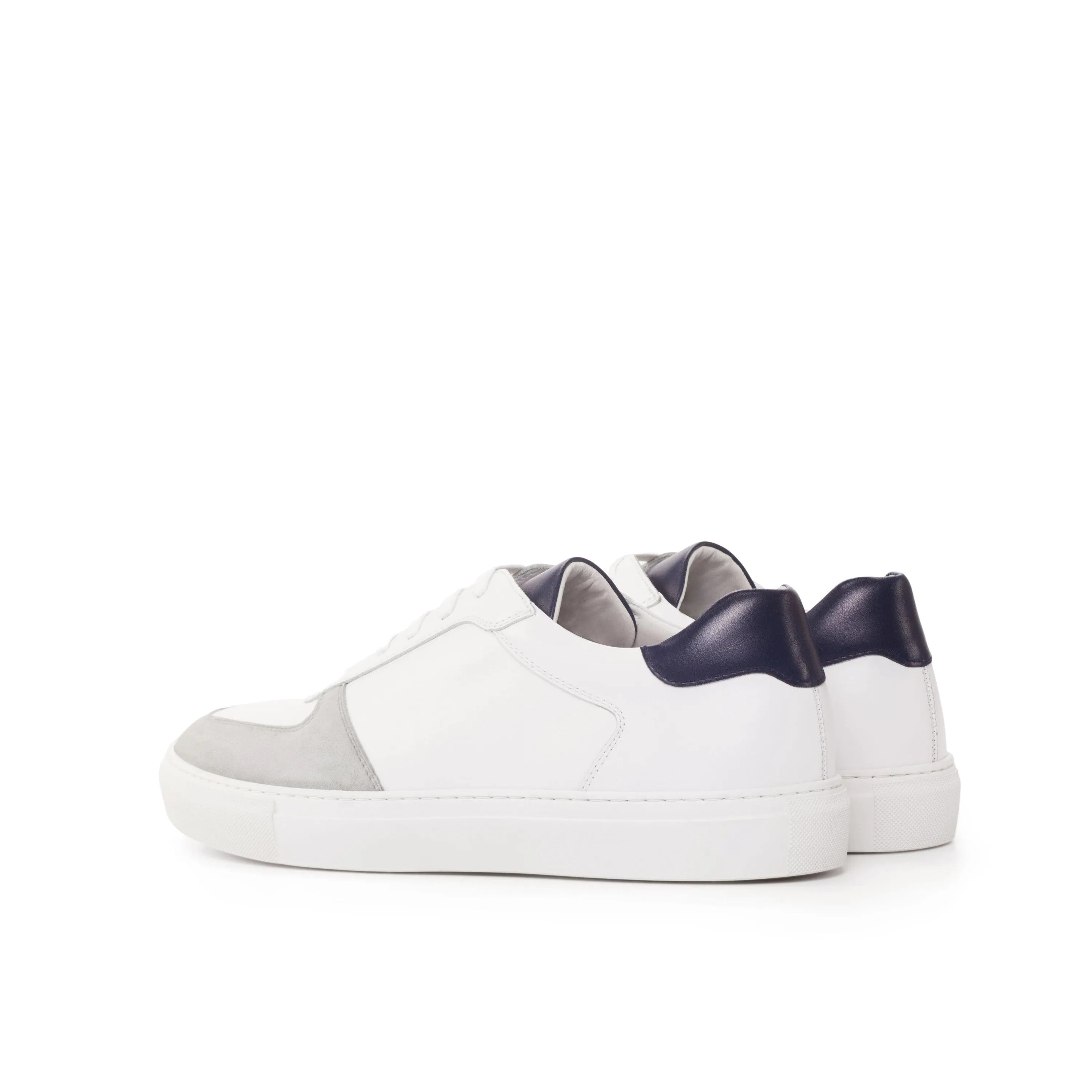 White leather DW15 Low Top Sneaker II with navy heel, crafted in box calf for luxury