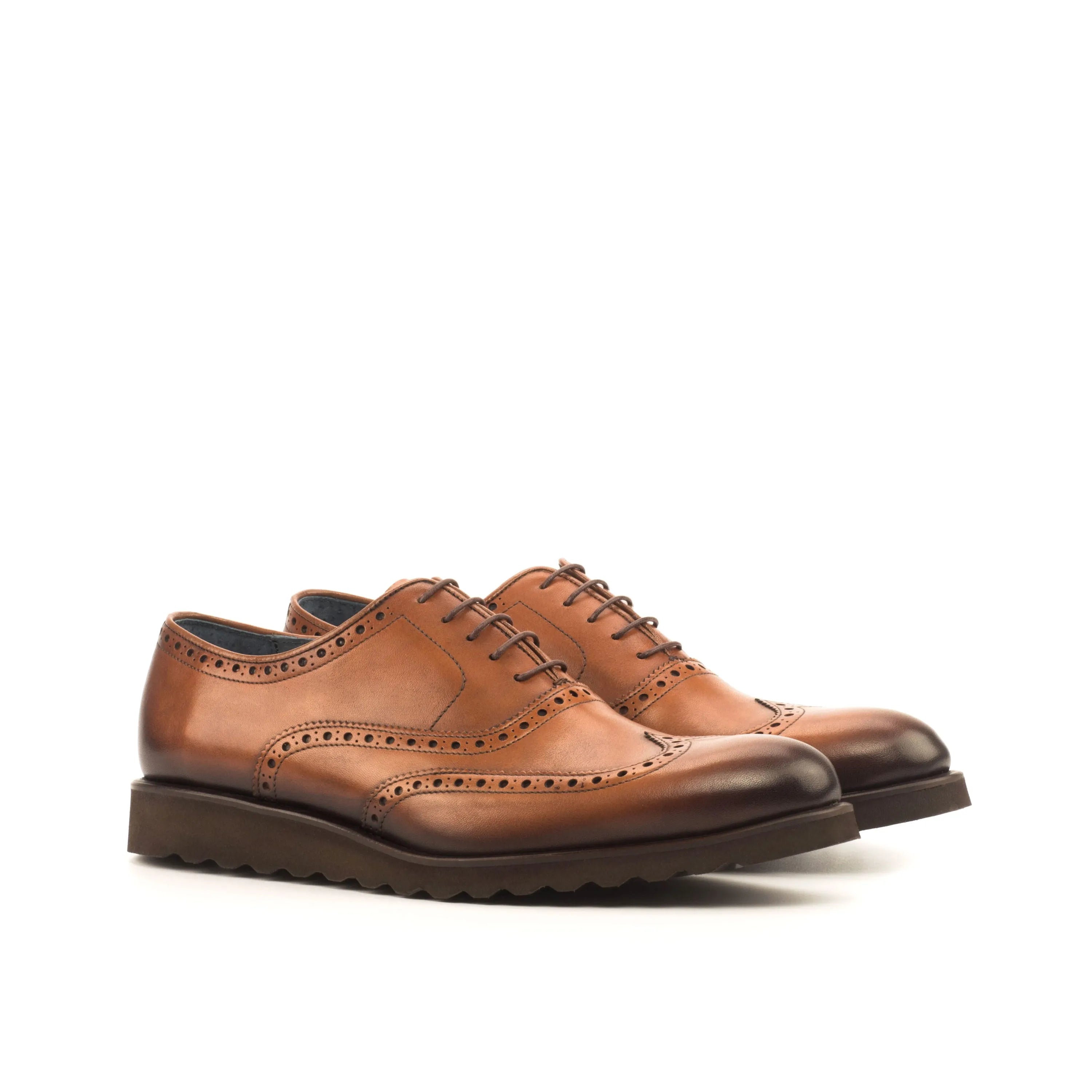 Brown leather wingtip dress shoes from Dyami, luxury bespoke brogue shoes for men