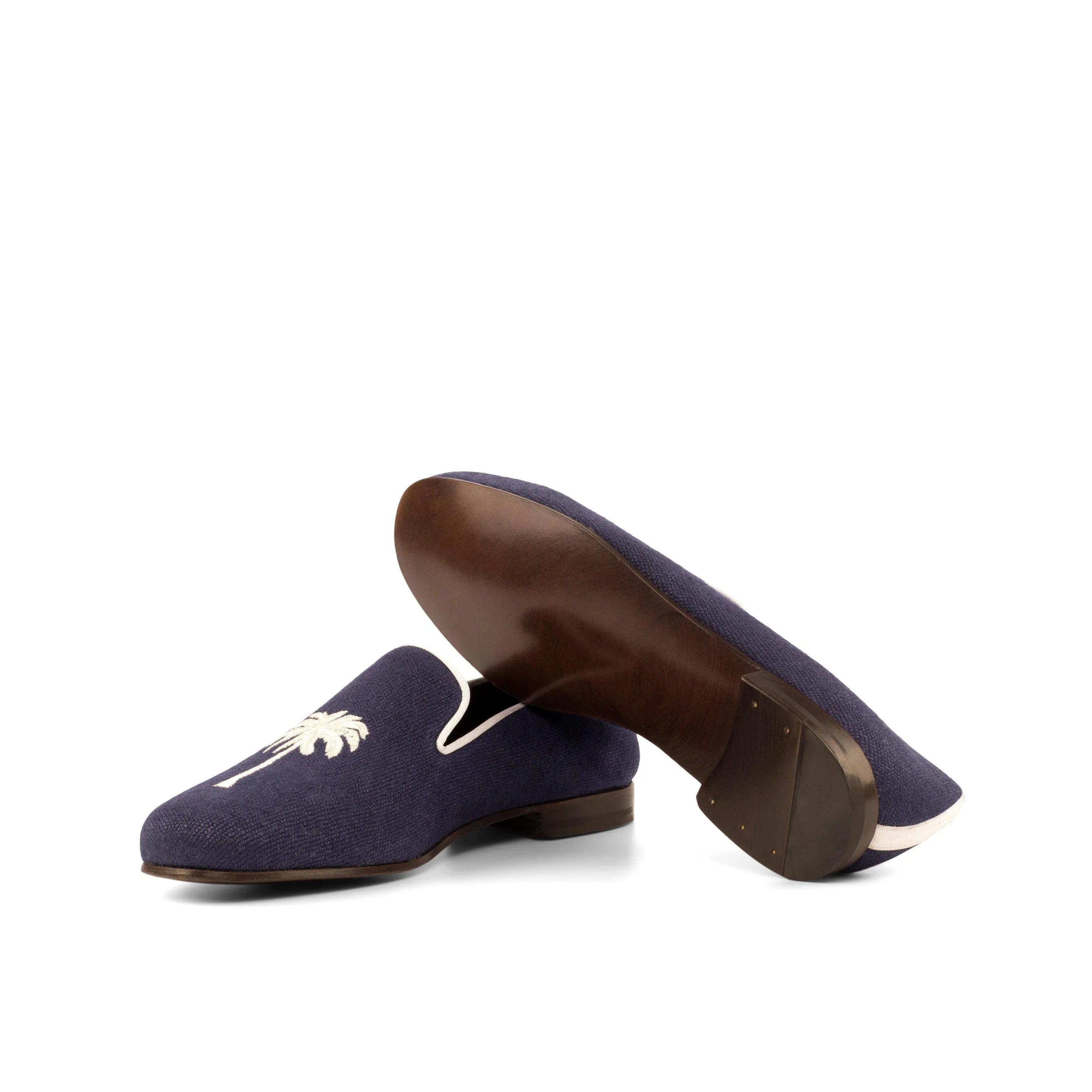 Navy blue palm tree loafers from the Eagle Wellington slip collection for stylish comfort