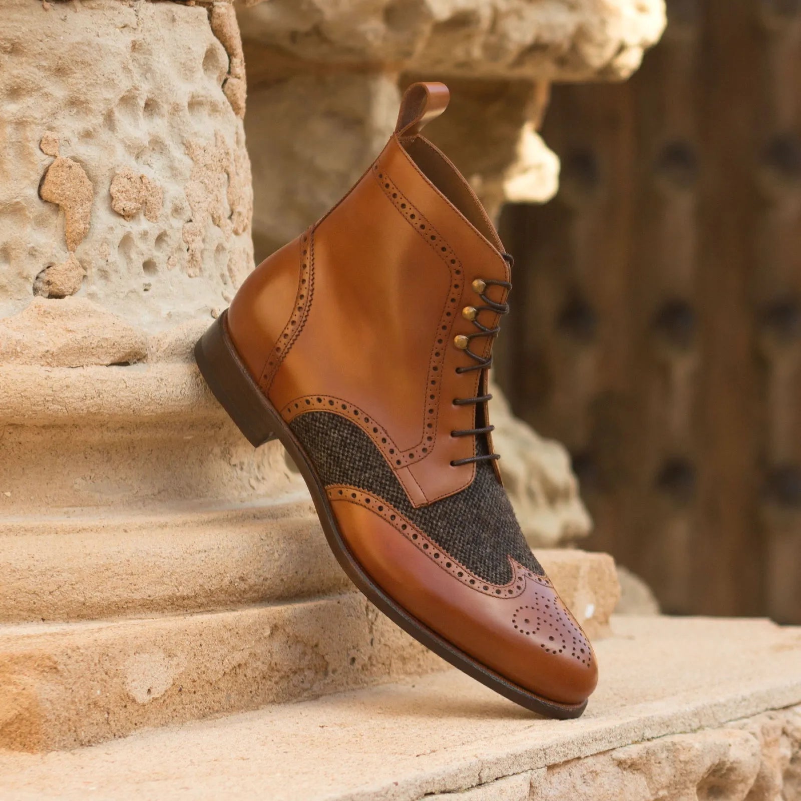 Brown leather and tweed Eisen Military Brogue Boots showcasing classic wingtip design