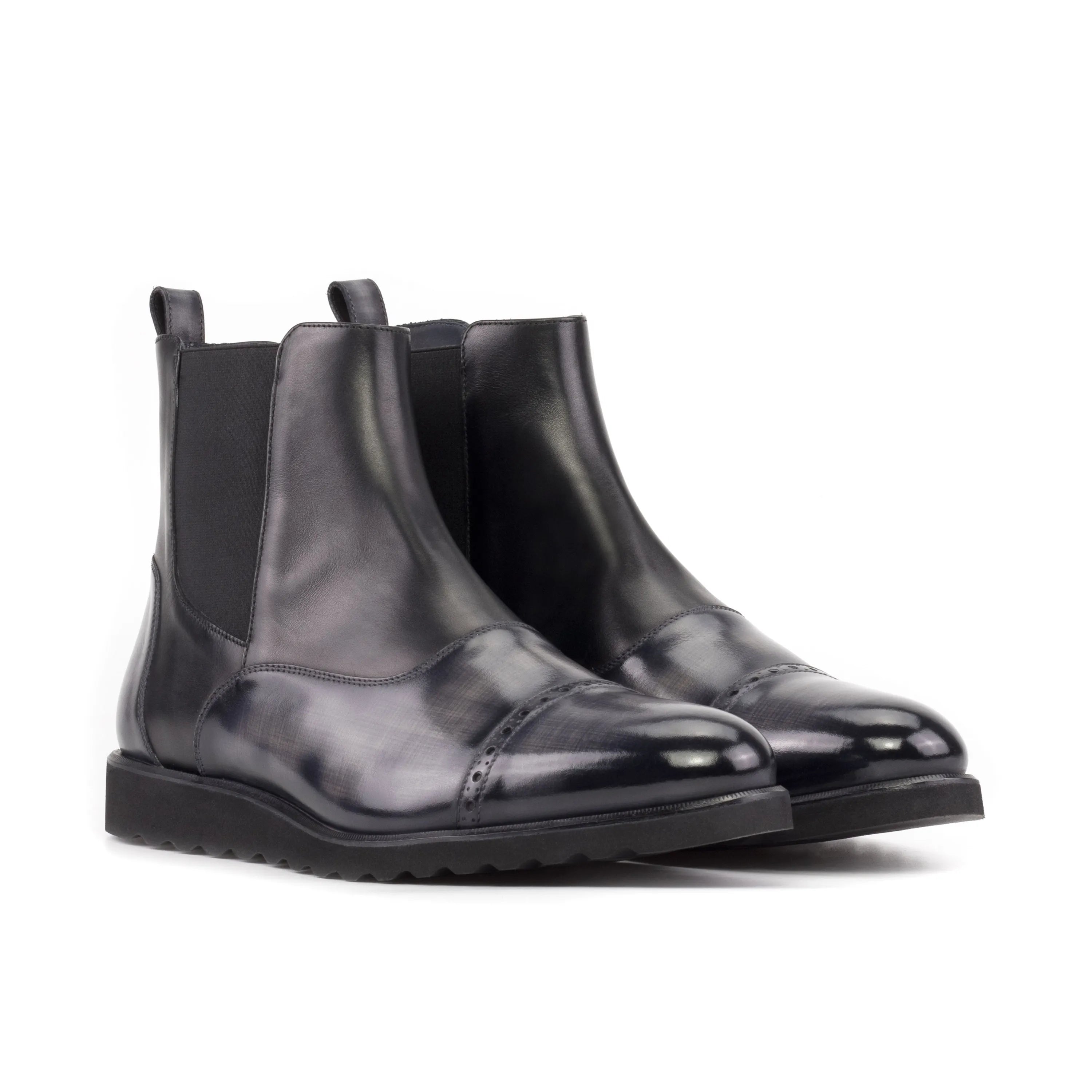 Pair of Elysian Patina Chelsea Boots in black leather, stylish and versatile footwear