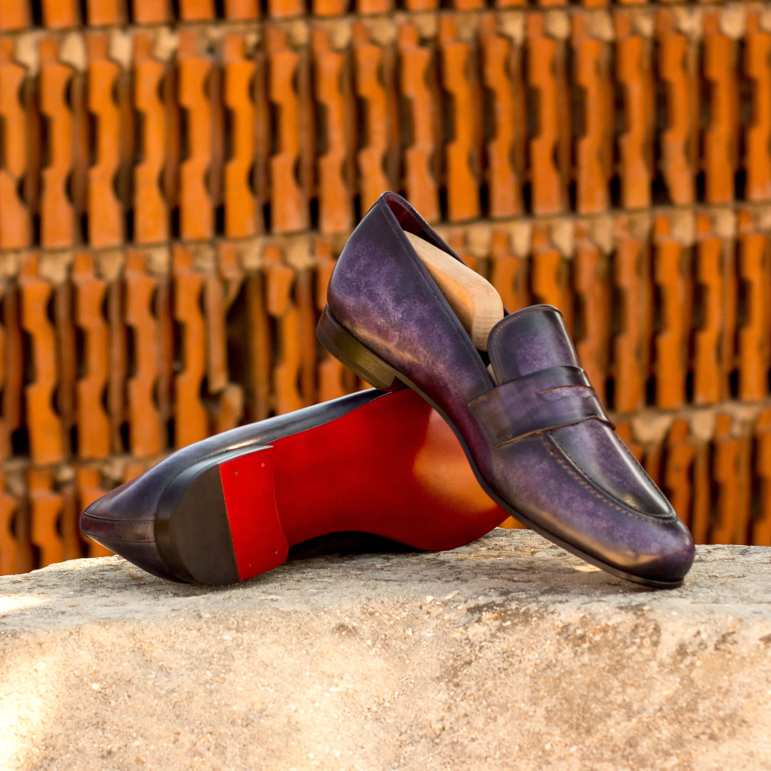 Purple leather loafers with red soles from Euclid Wellington Patina slip on collection