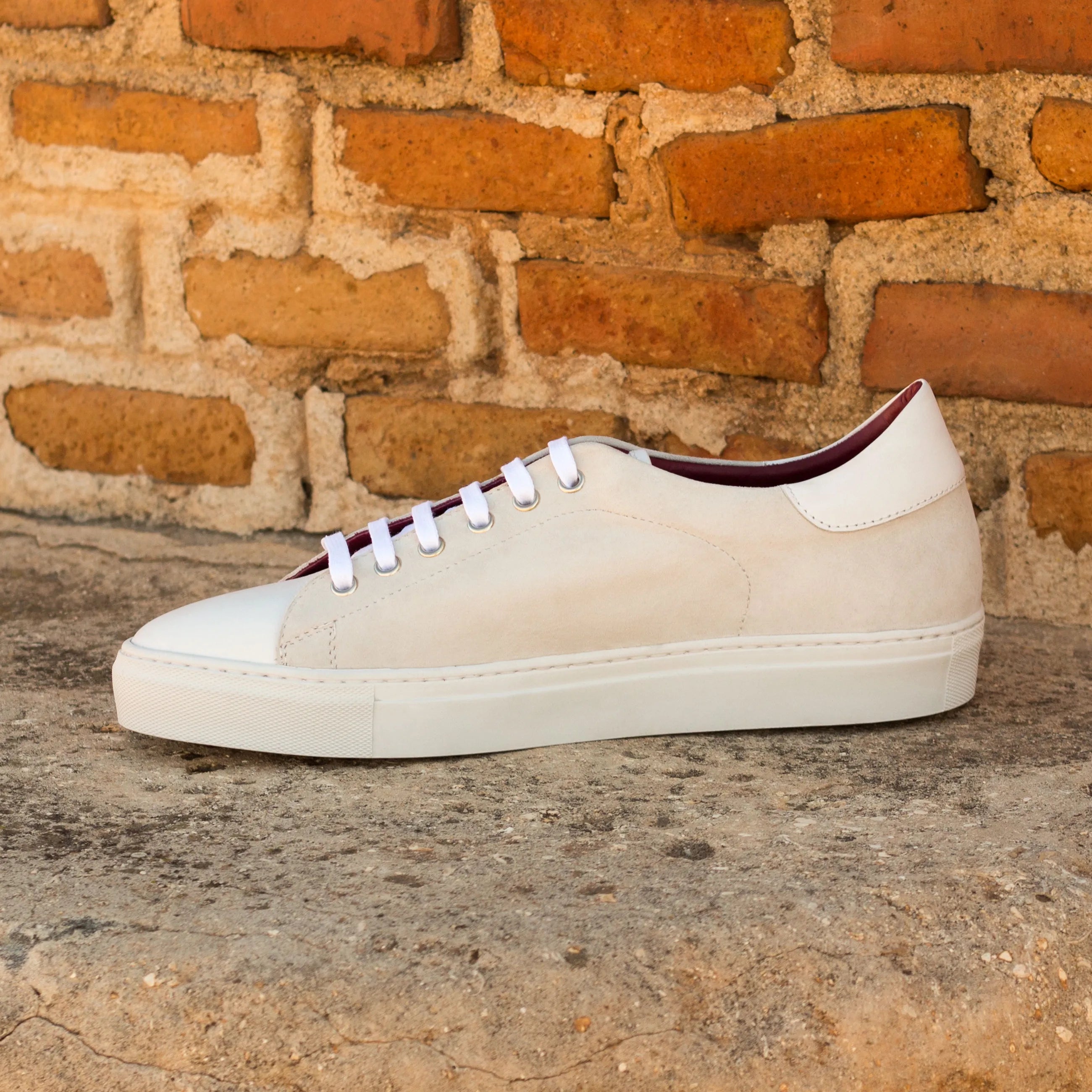 Evander Trainer Sneaker featuring a stylish white leather design for casual wear