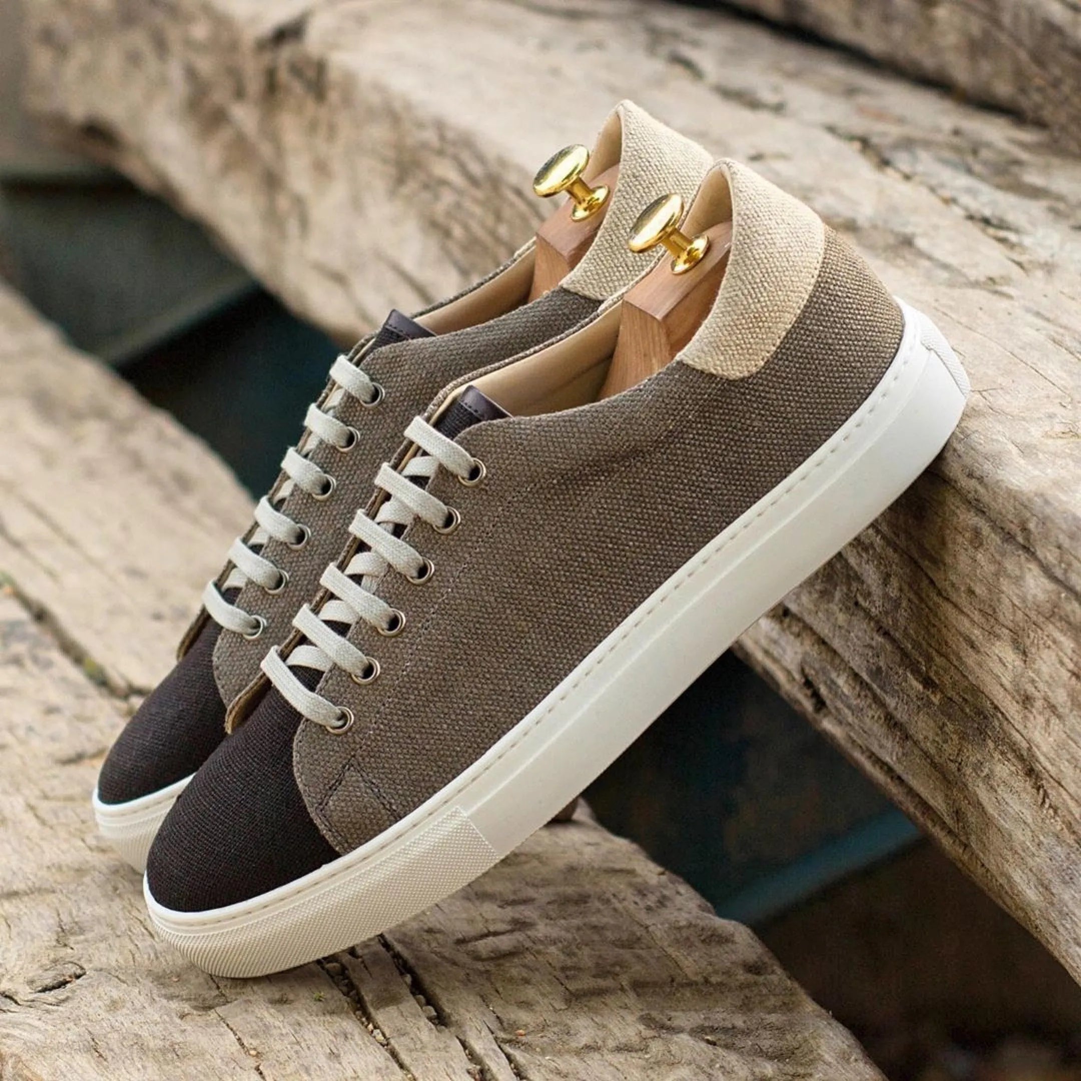 Two-tone canvas sneakers showcasing the Eyoun Trainer Sneaker style