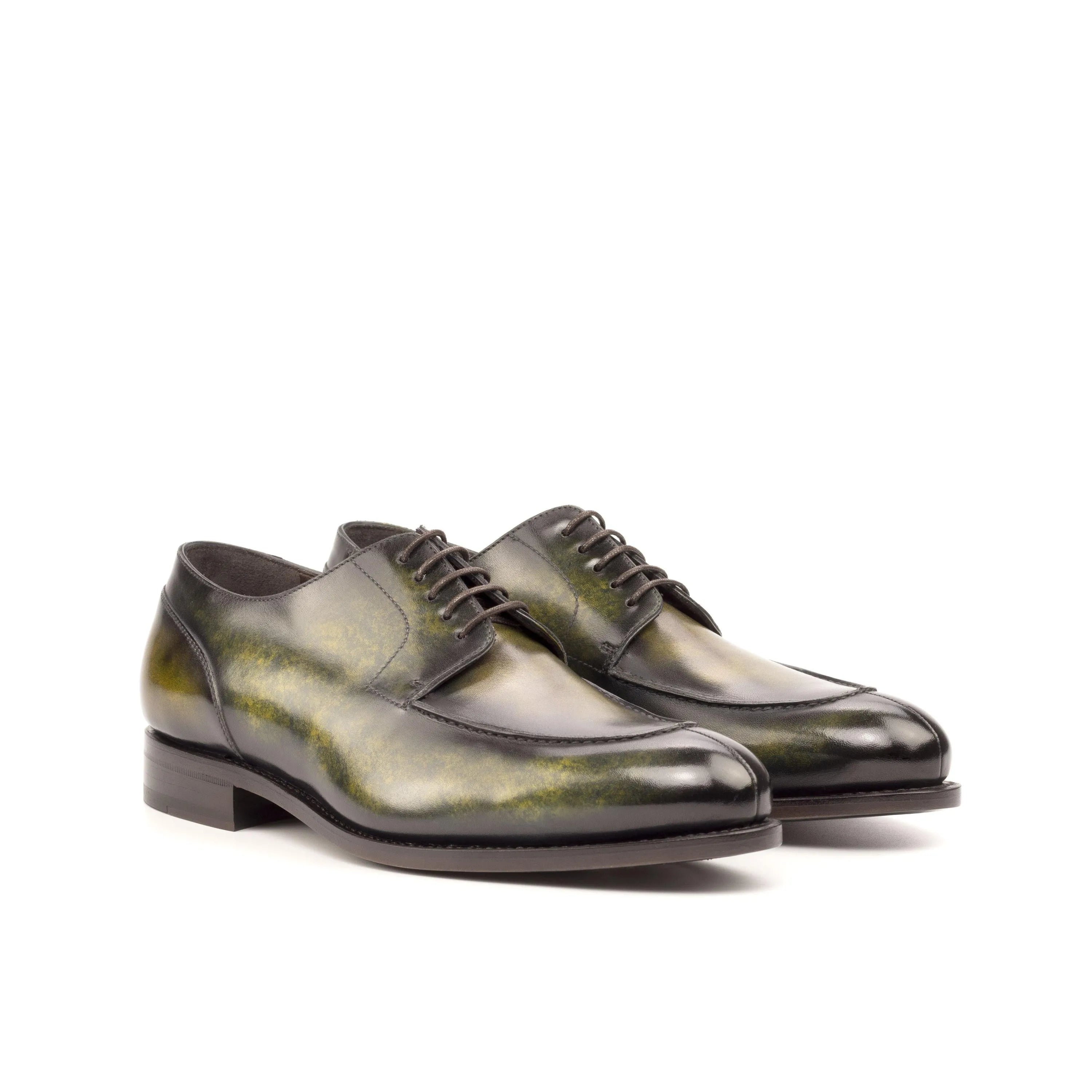 Green leather Fabien Derby Split Toe Patina shoes showcasing elegant craftsmanship