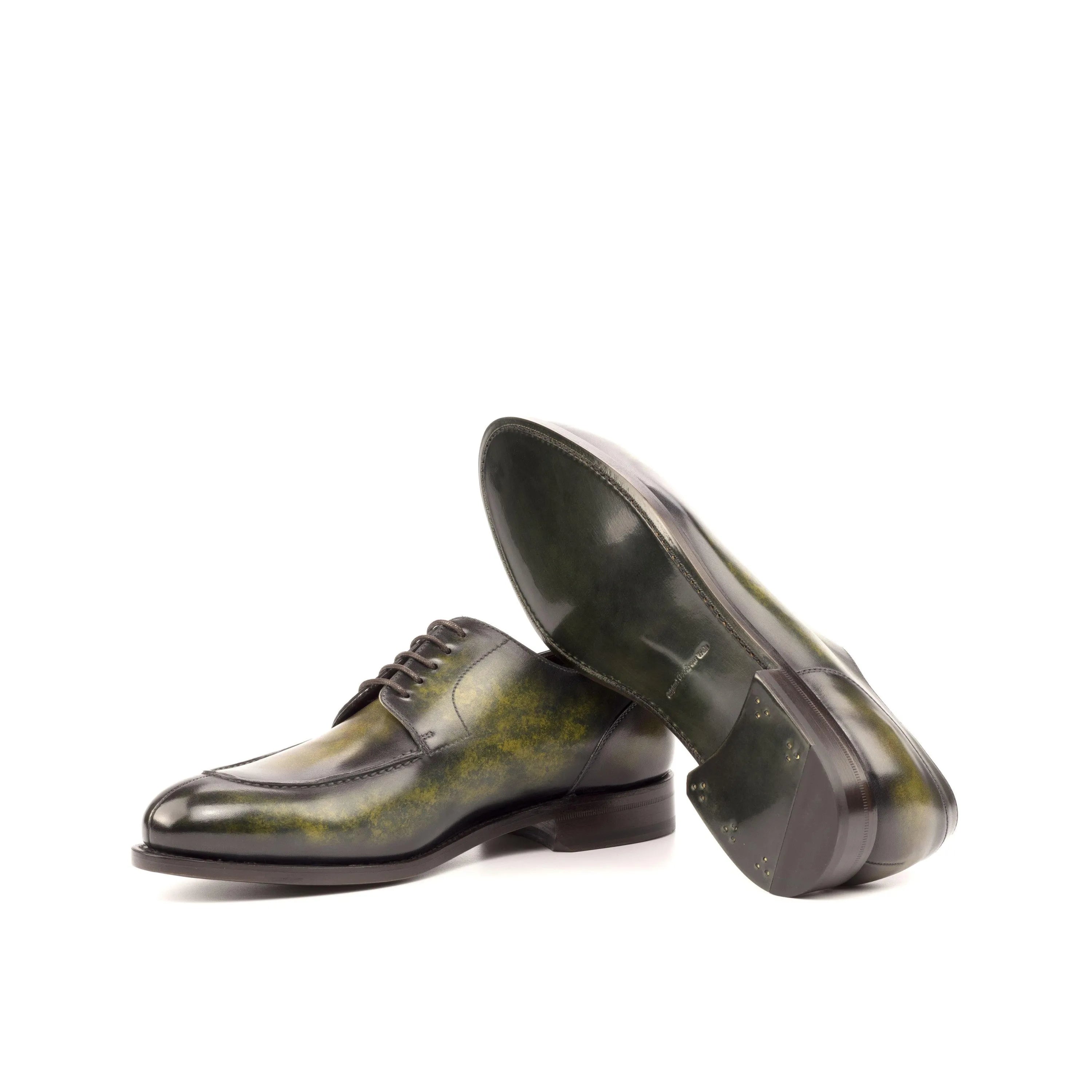 Green leather Fabien Derby Split Toe Patina shoes showcasing elegant craftsmanship