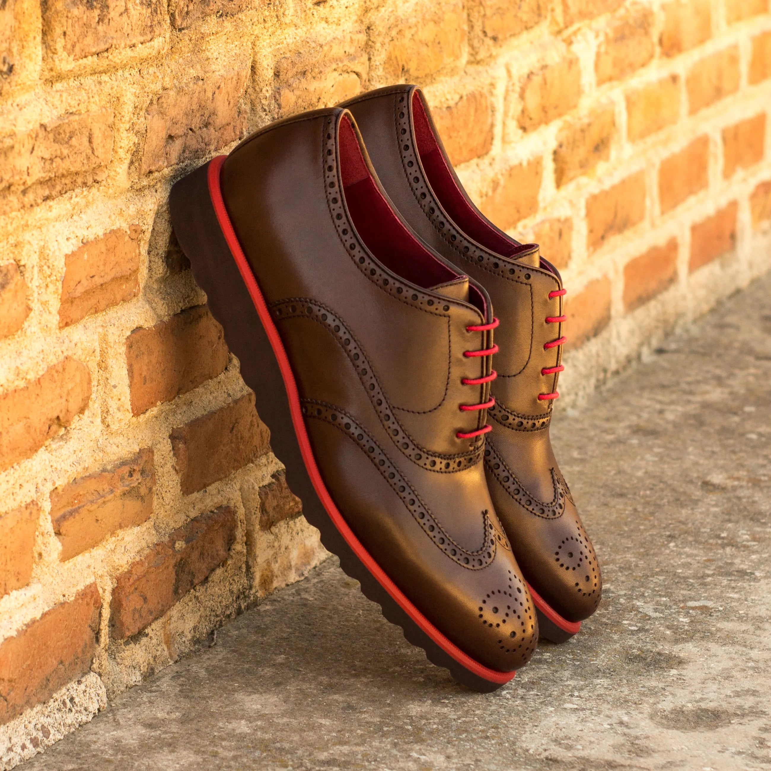 Brown leather Fabuis Full Brogue Shoes featuring red accents and long wingtip blucher design