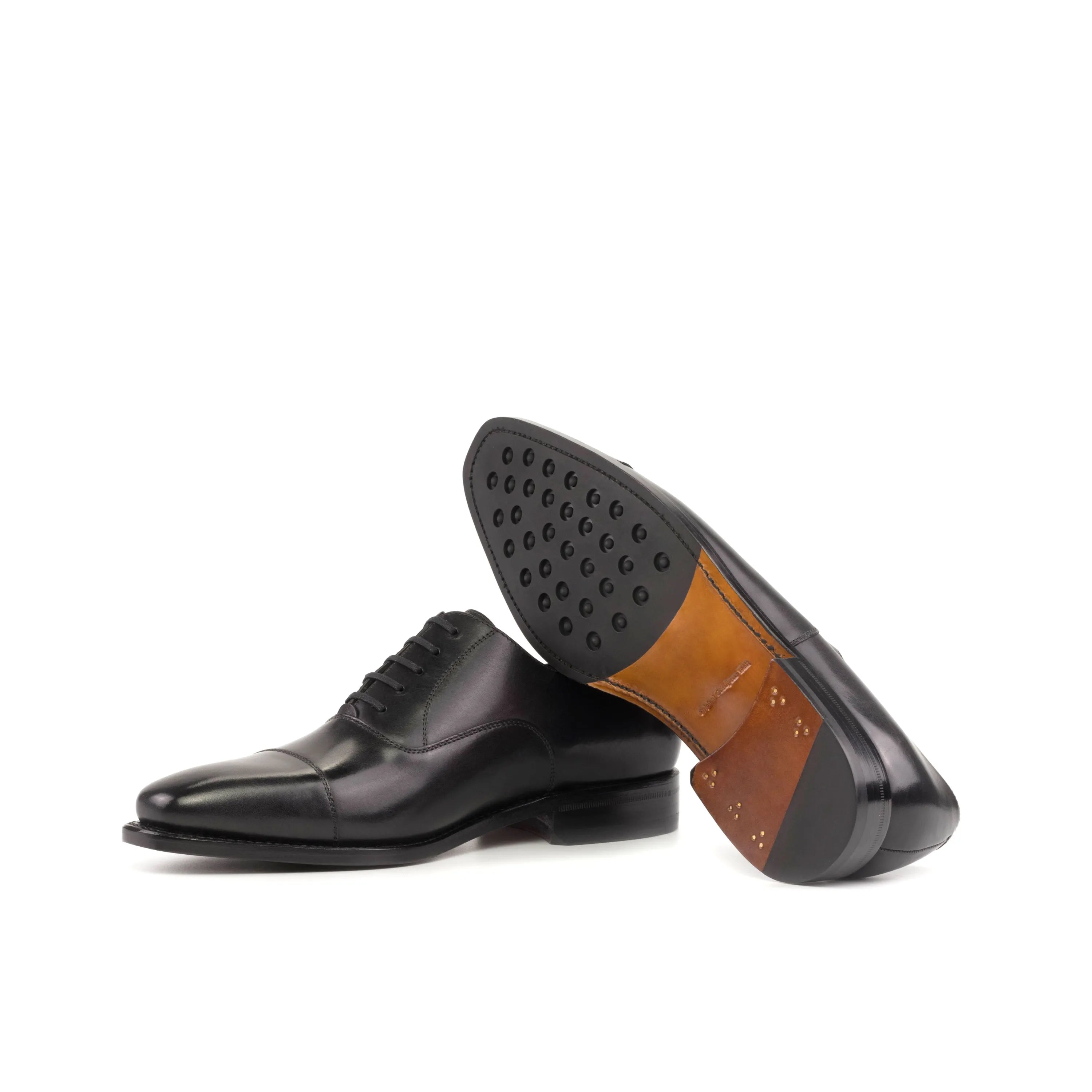 Pair of black leather dress shoes, Farell Oxford shoes for the fast lane lifestyle