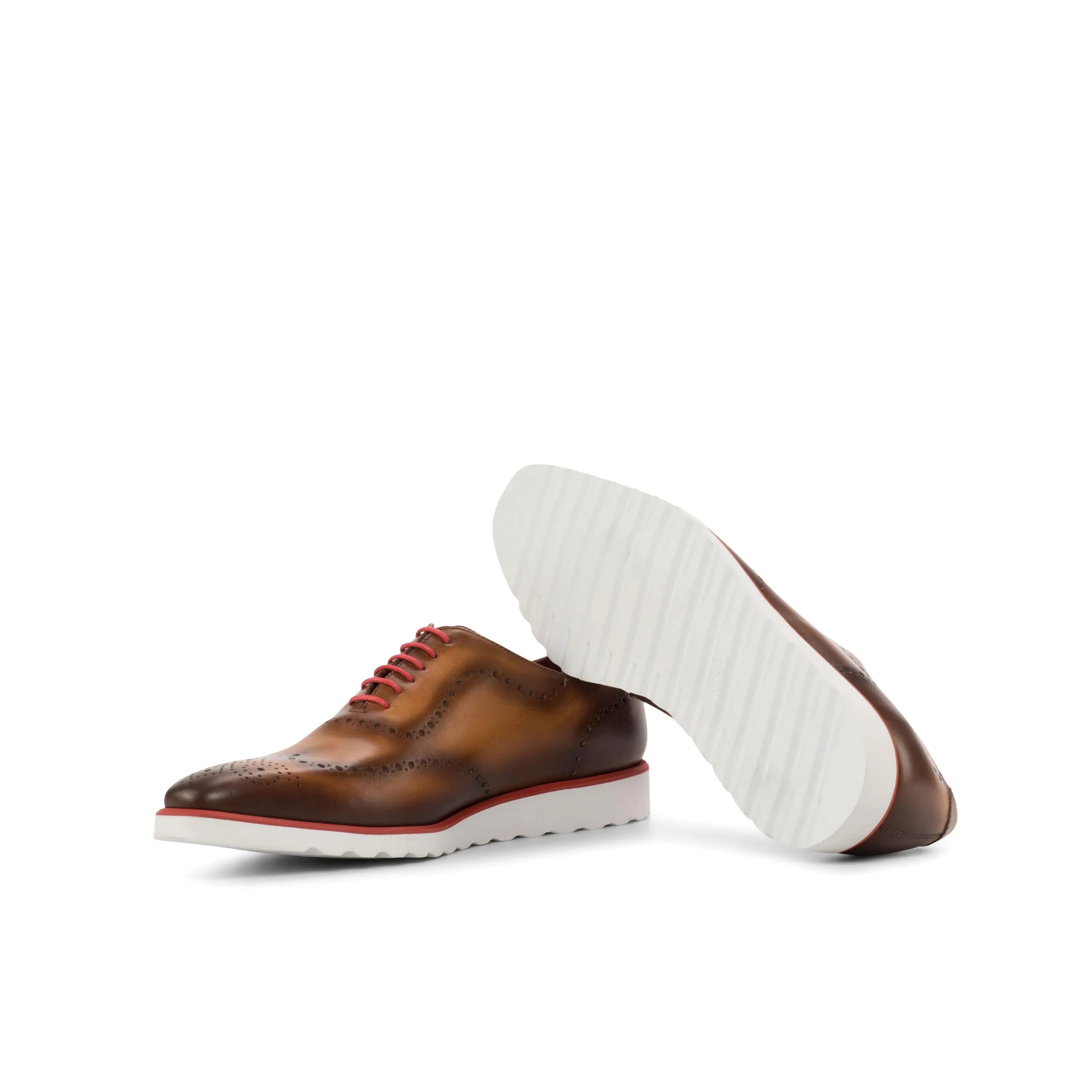 Brown leather Faro WholeCut shoes with red laces and white soles for stylish elegance