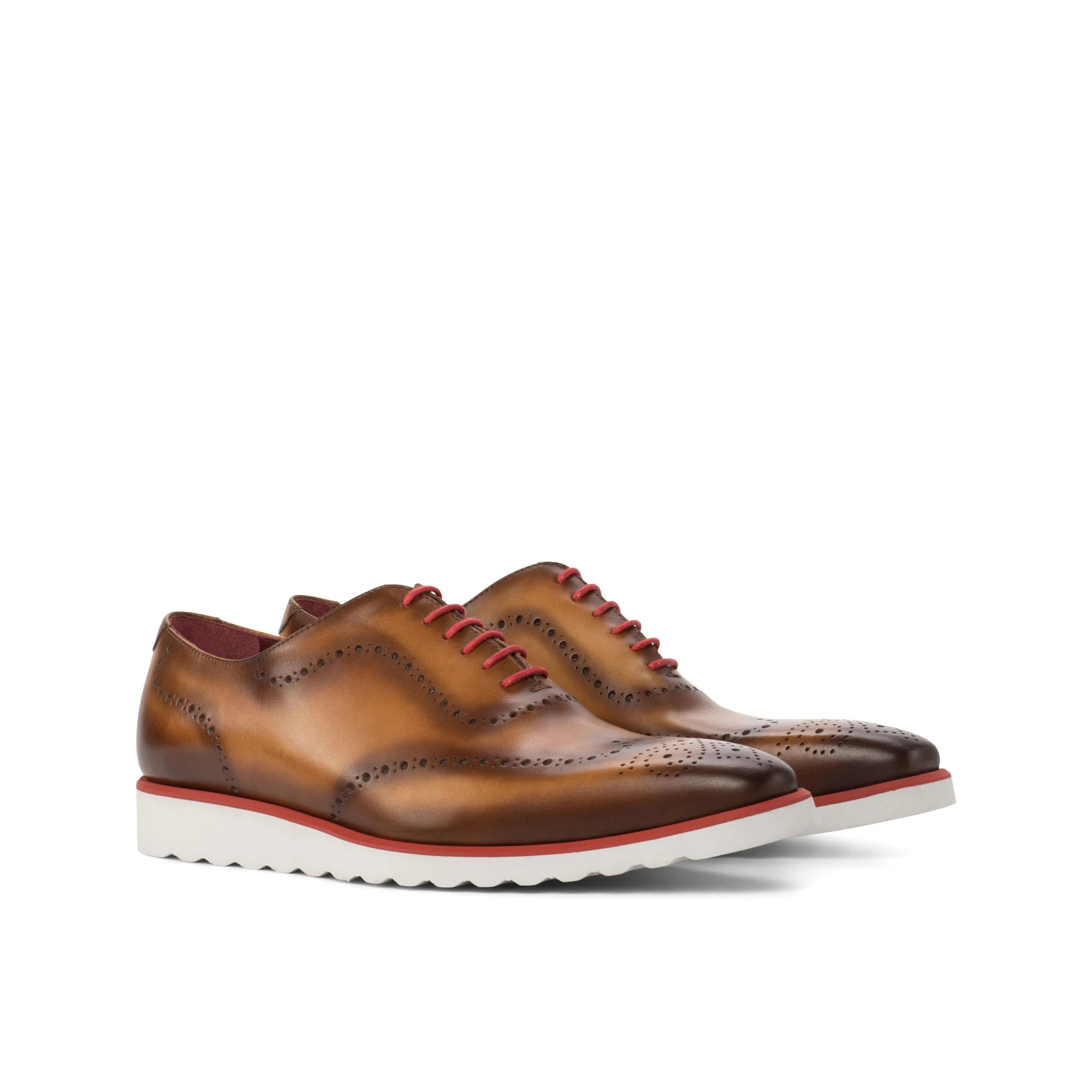 Brown leather wingtip dress shoes showcasing Faro WholeCut craftsmanship and style