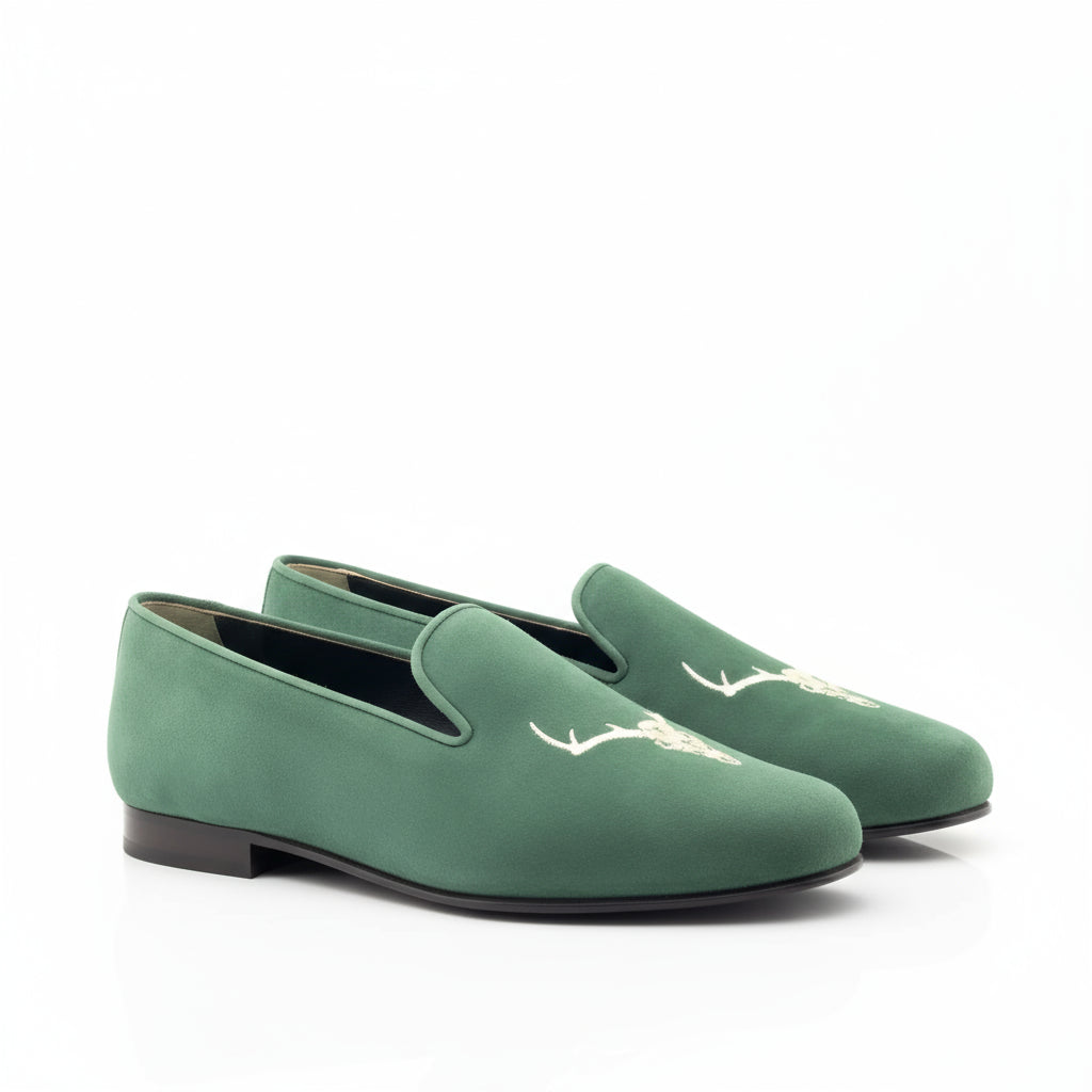 Green suede loafers with stag embroidery from Forst Wellington slip on collection