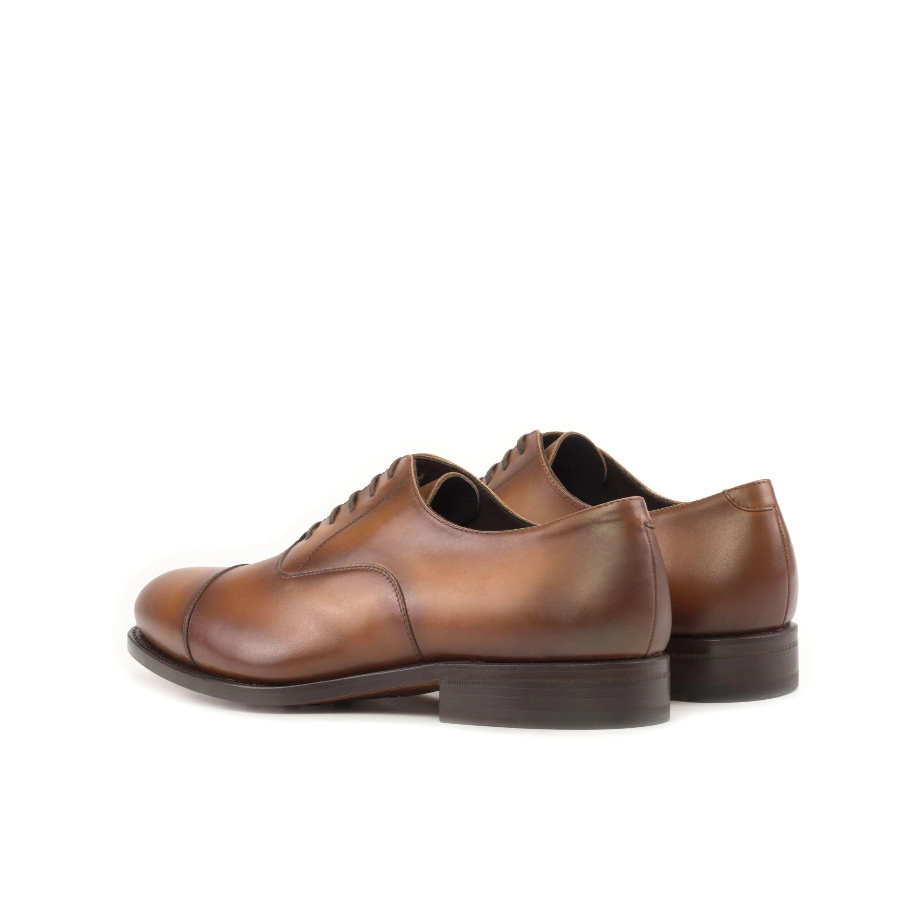 Pair of Founder Oxford shoes in rich brown leather for formal occasions and stylish flair