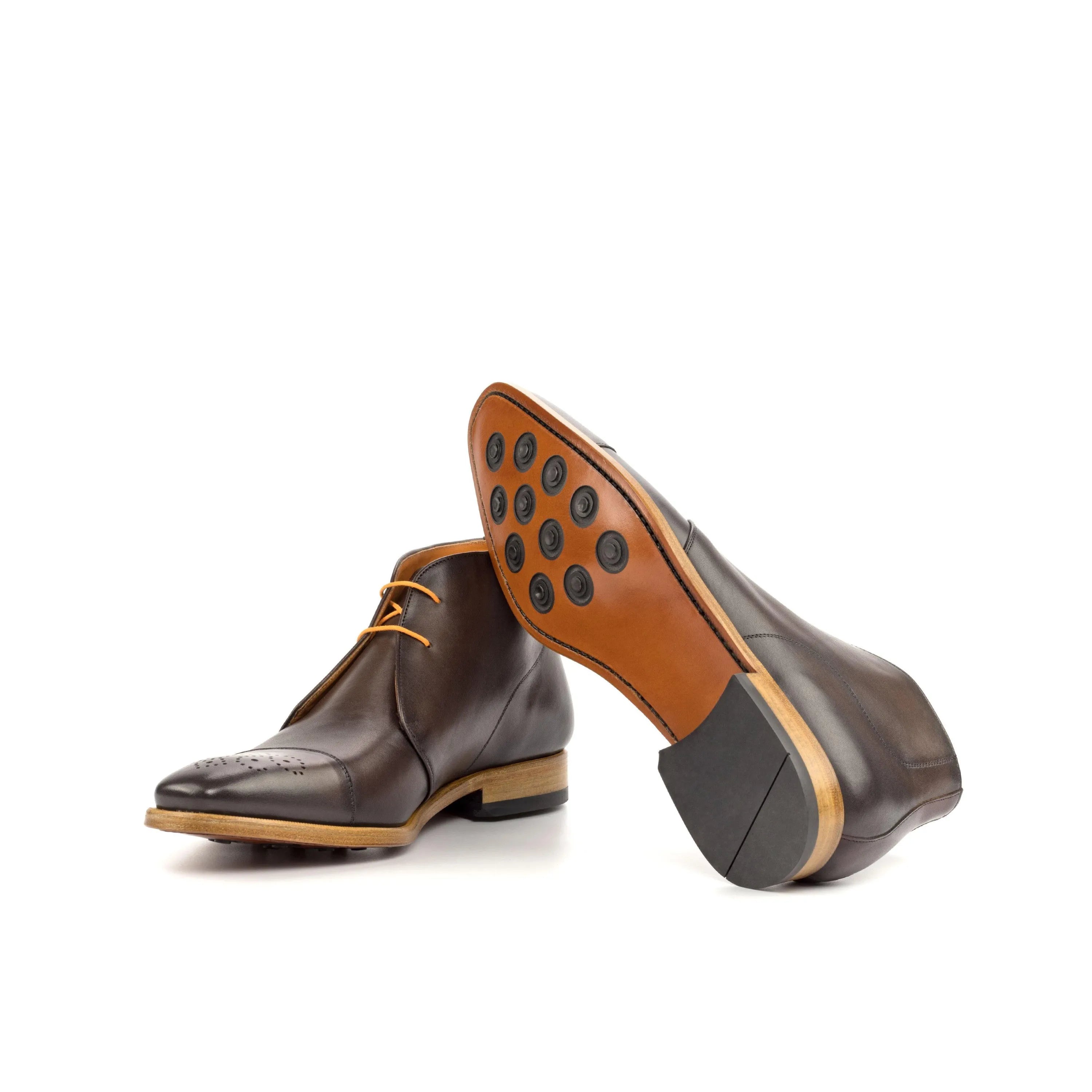 Brown leather Franko Chukka boots showcasing stylish and versatile footwear design
