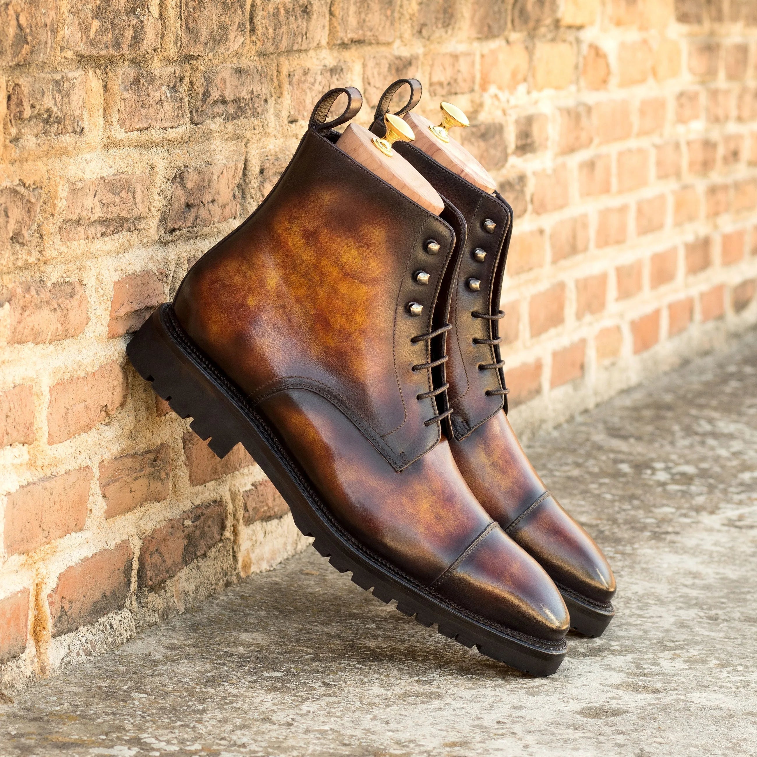 Brown leather lace-up Frankoz Patina Jumper Boots II showcasing stylish craftsmanship