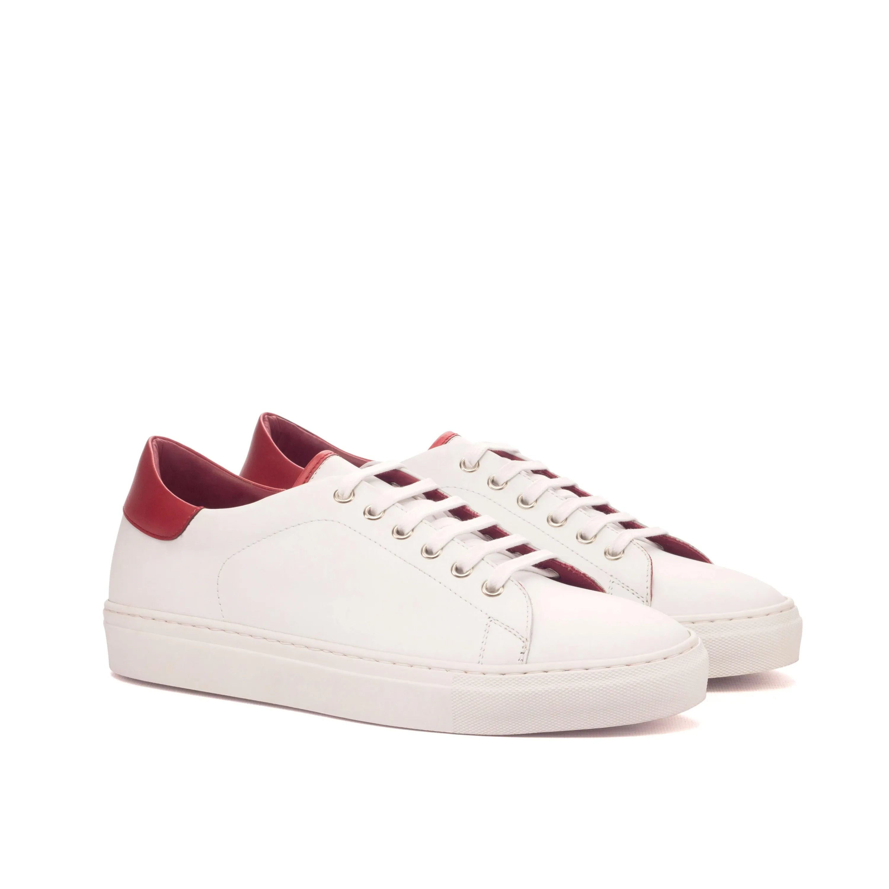White leather Fridays Trainer Sneakers with red accents featuring a cupsole design